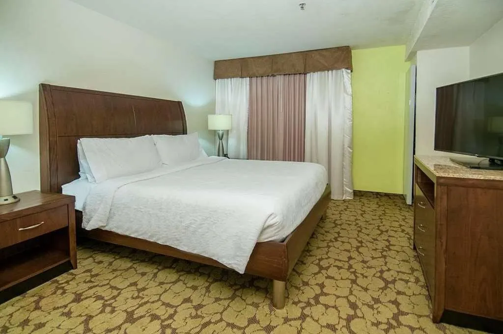 Bed in Wyndham Garden New Orleans Airport