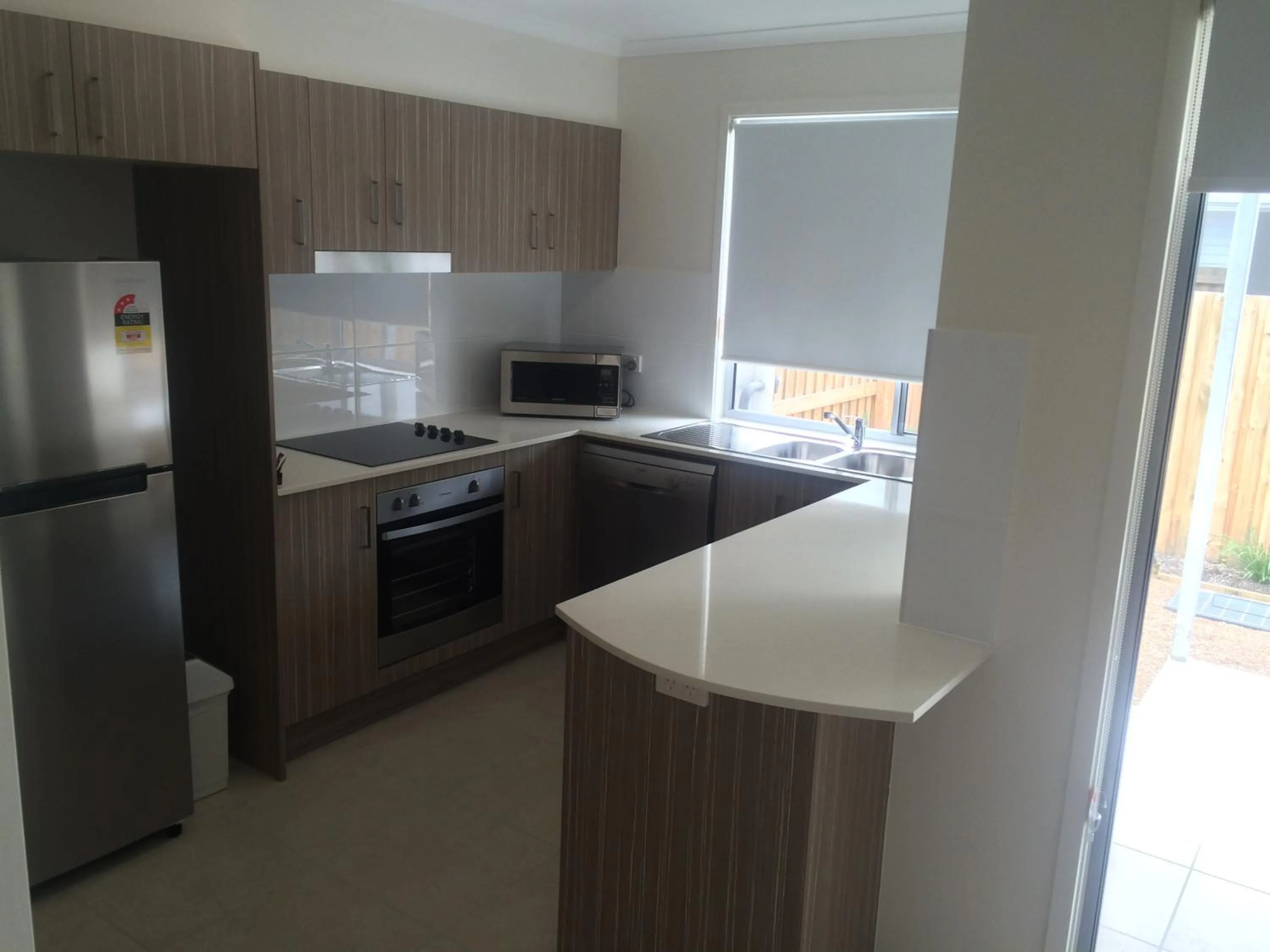 Kitchen or kitchenette in Direct Collective - Breeze on Brightwater