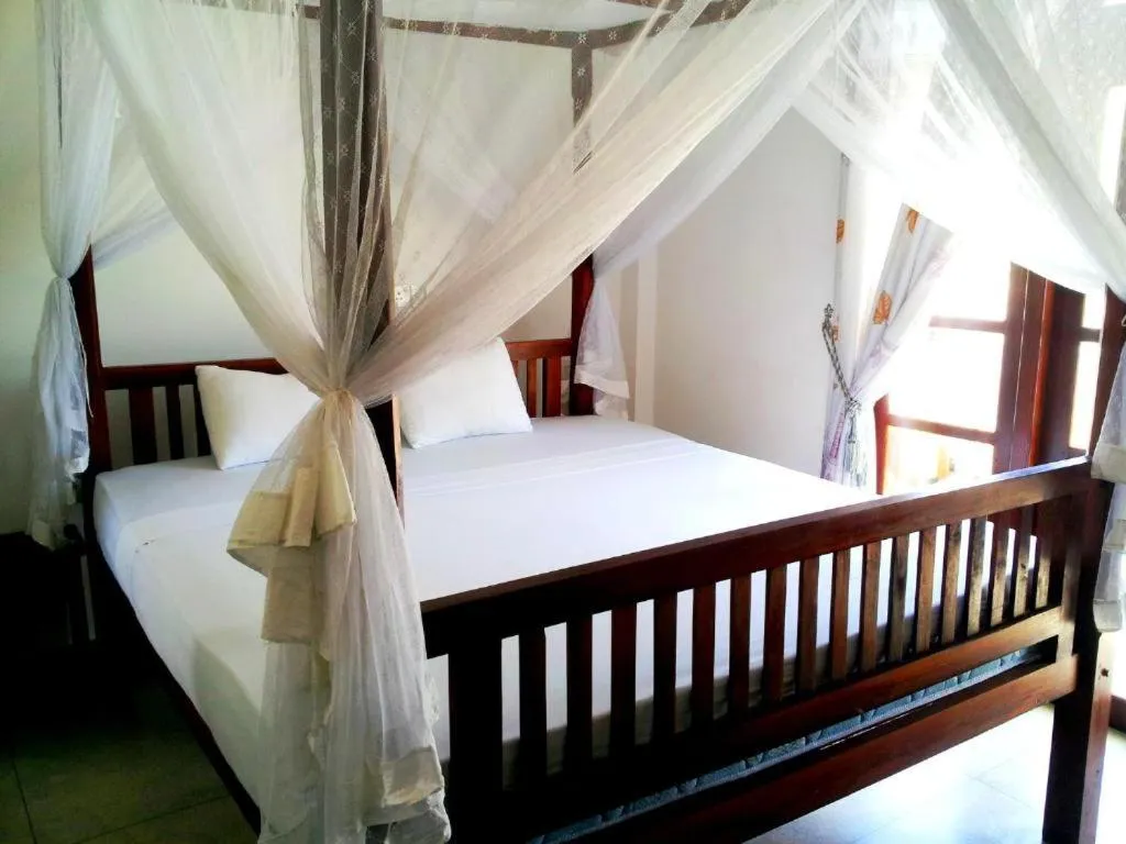 Bed in Ceylon Surf Guest and Restaurant