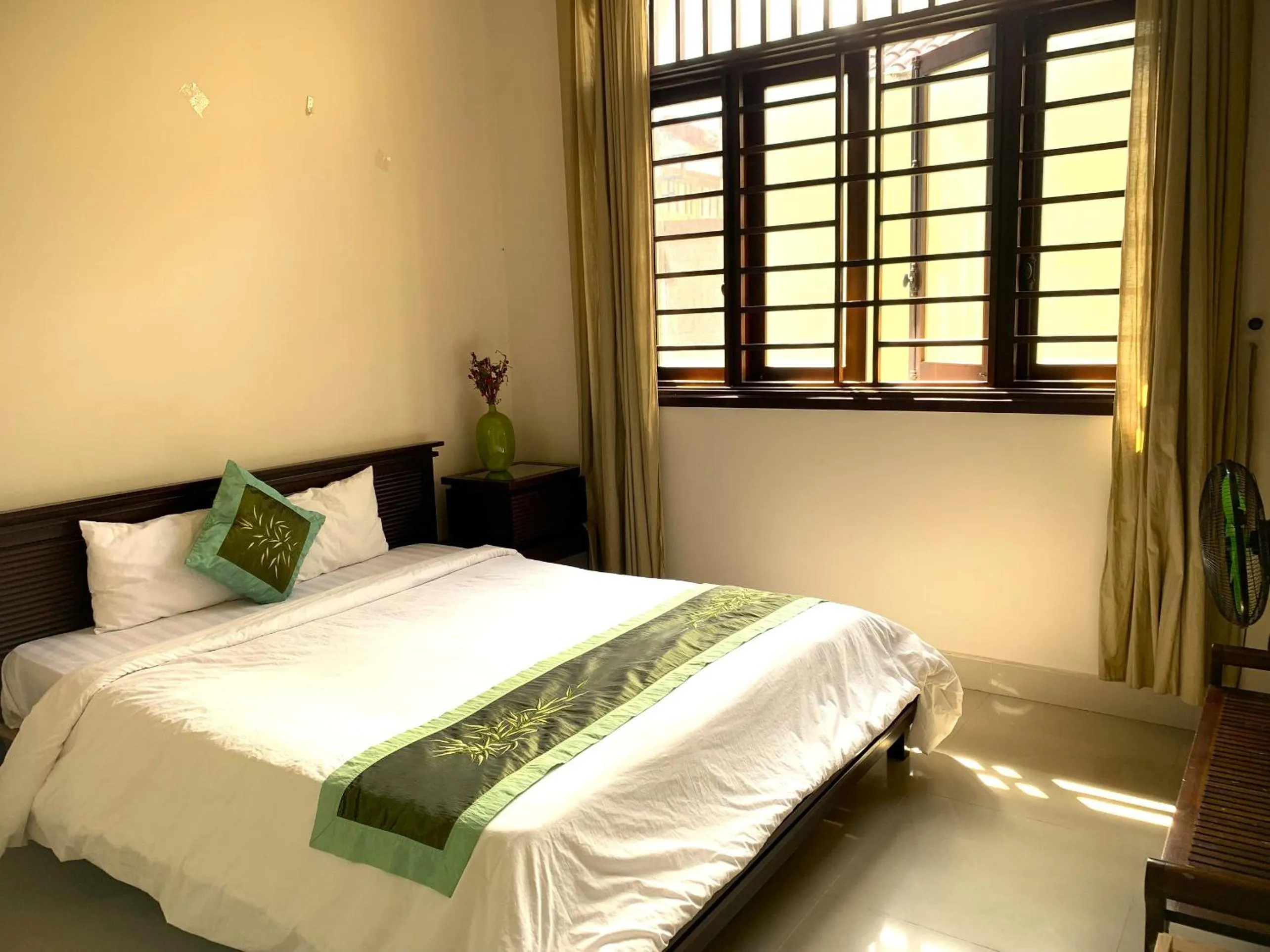 Bed in Jolie Villa Hoi An