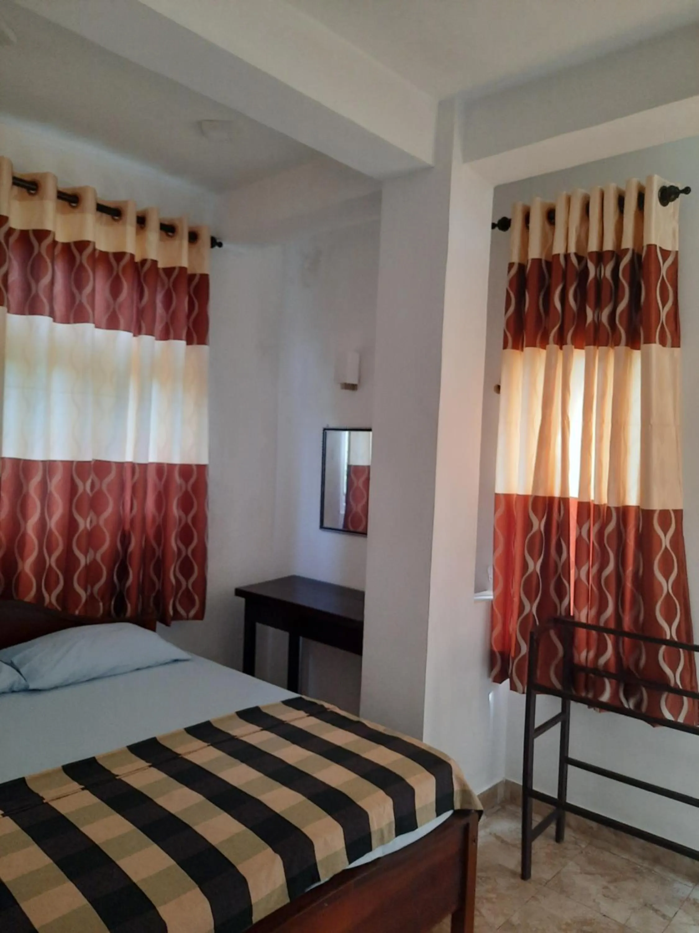 Bed in White Surfing Beach Resort