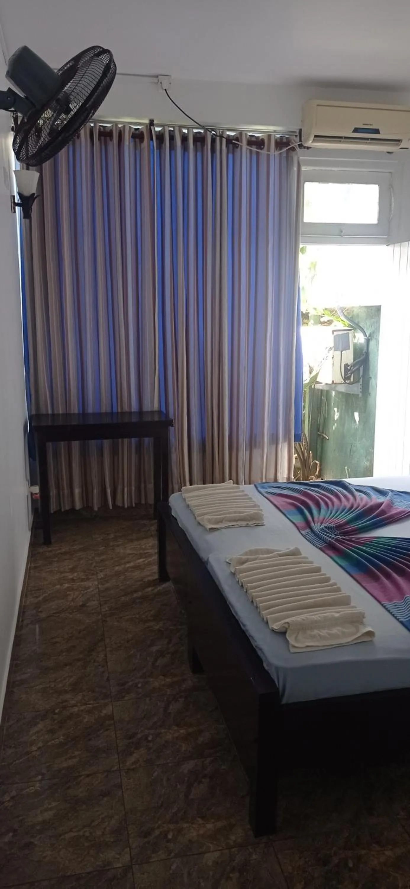 Bed in White Surfing Beach Resort