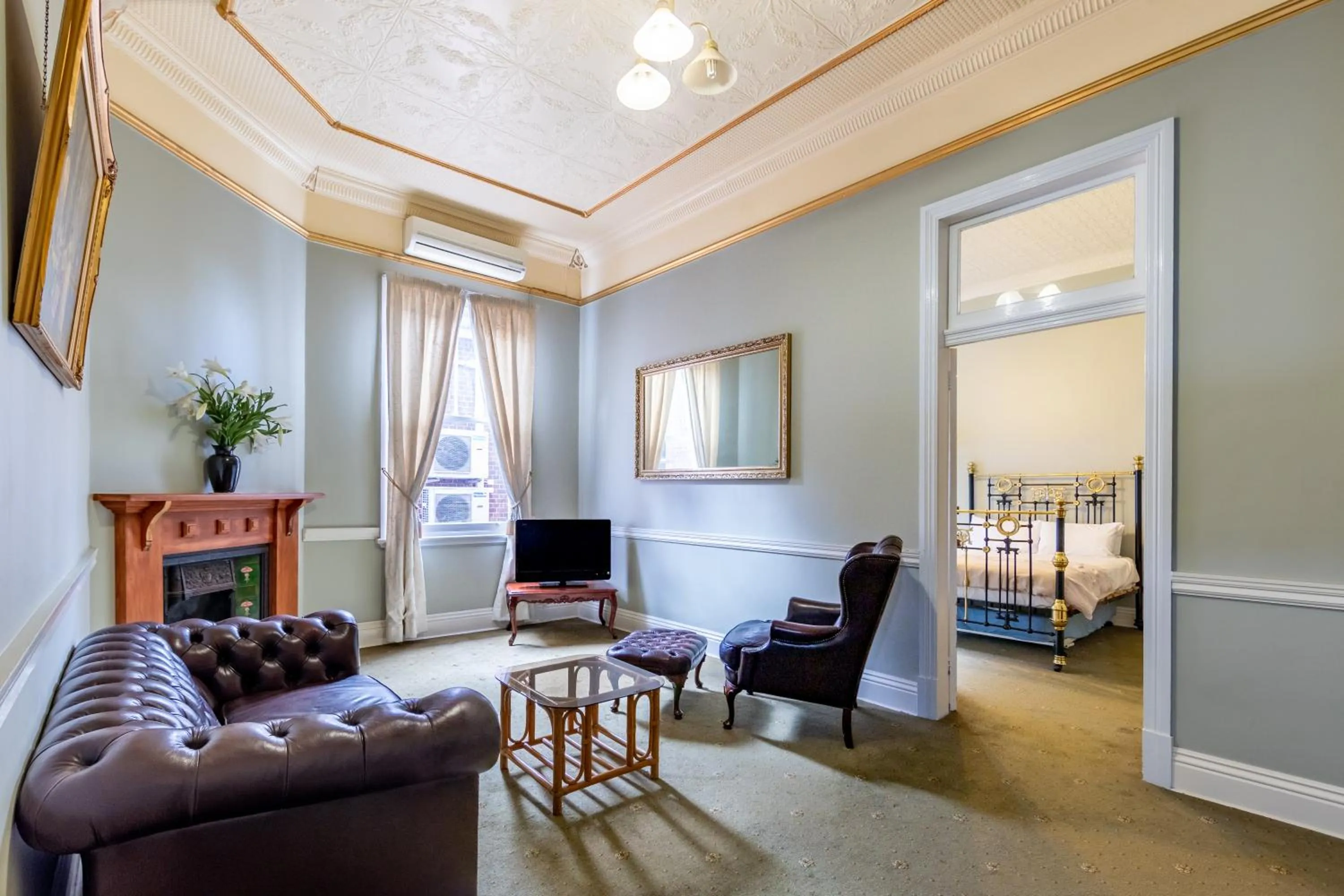 Bed in Criterion Warwick Hotel