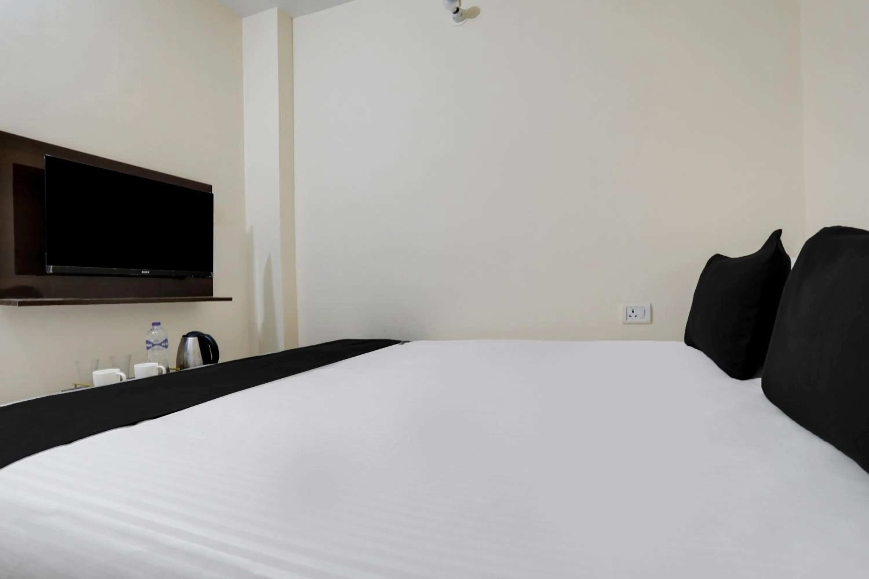 Bedroom in Hotel O M.V PALACE