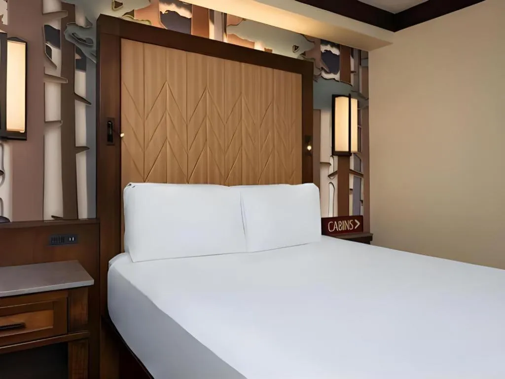 Bed in Disney's Wilderness Lodge
