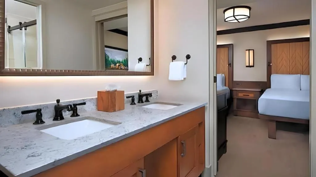 Bed in Disney's Wilderness Lodge