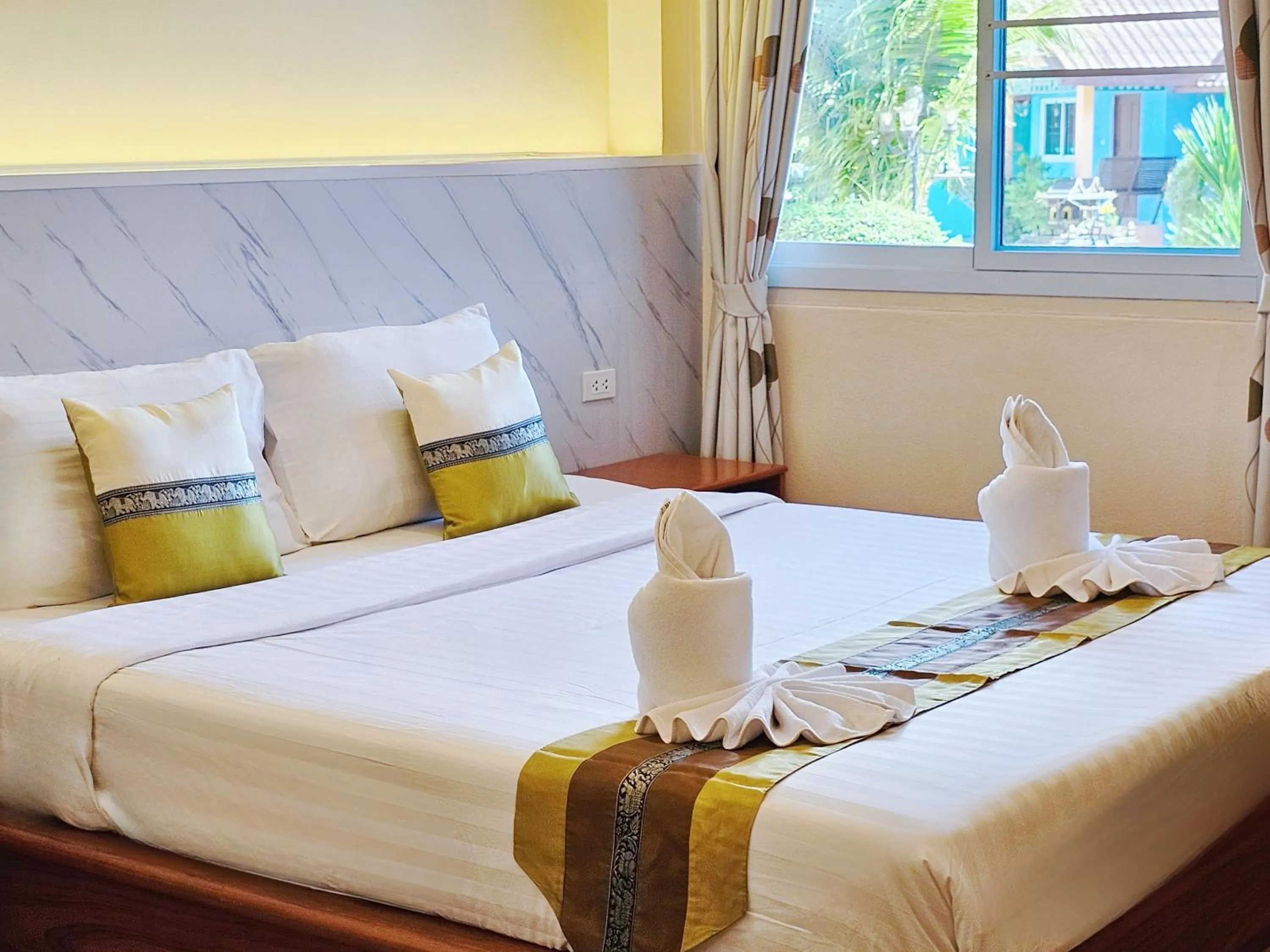 Bed in Phaithong Sotel Resort