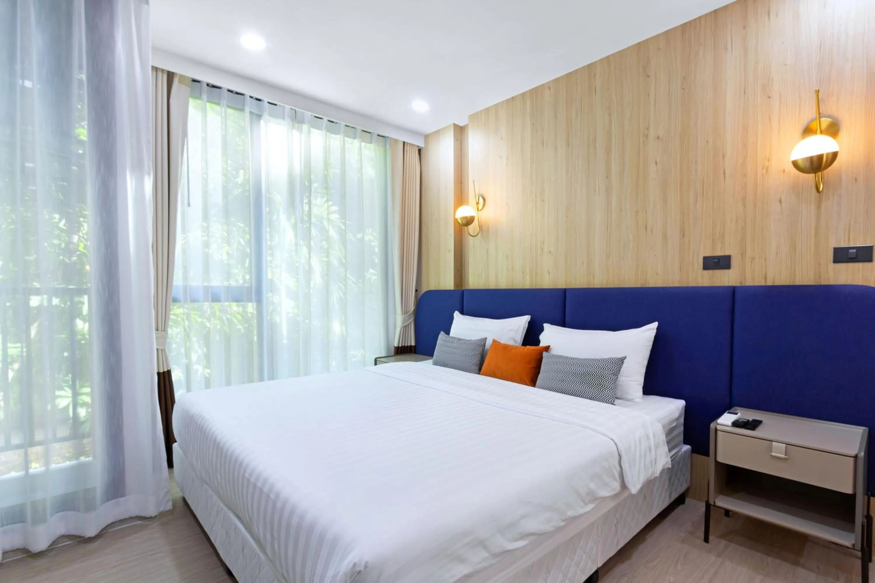 Bed in Aquila Hotel Bangkok