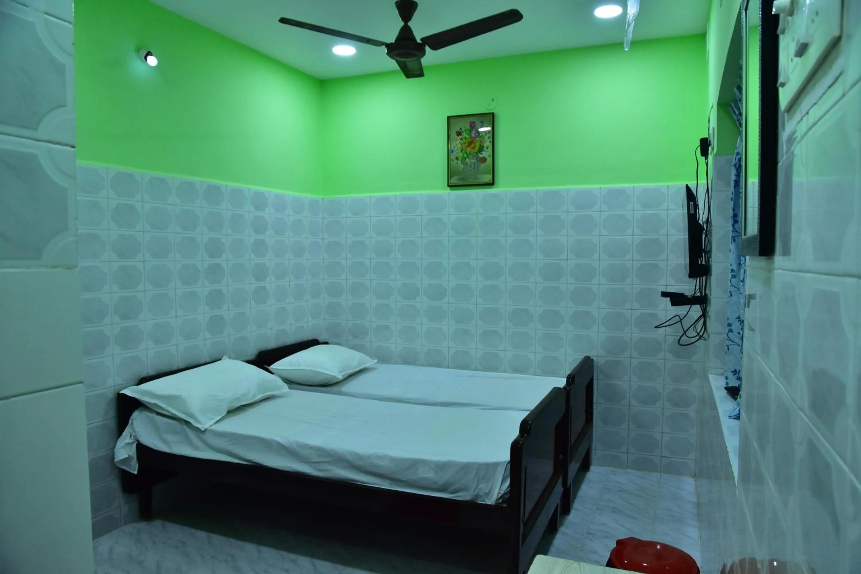 Bed in Sri Tirumalaa Hotel