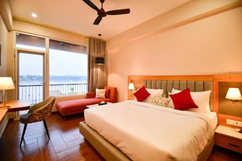 Photo of the whole room, Bed in Hotel Aviral Ganga