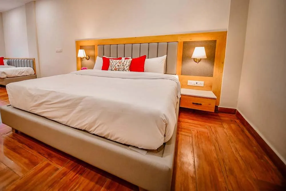 Photo of the whole room, Bed in Hotel Aviral Ganga