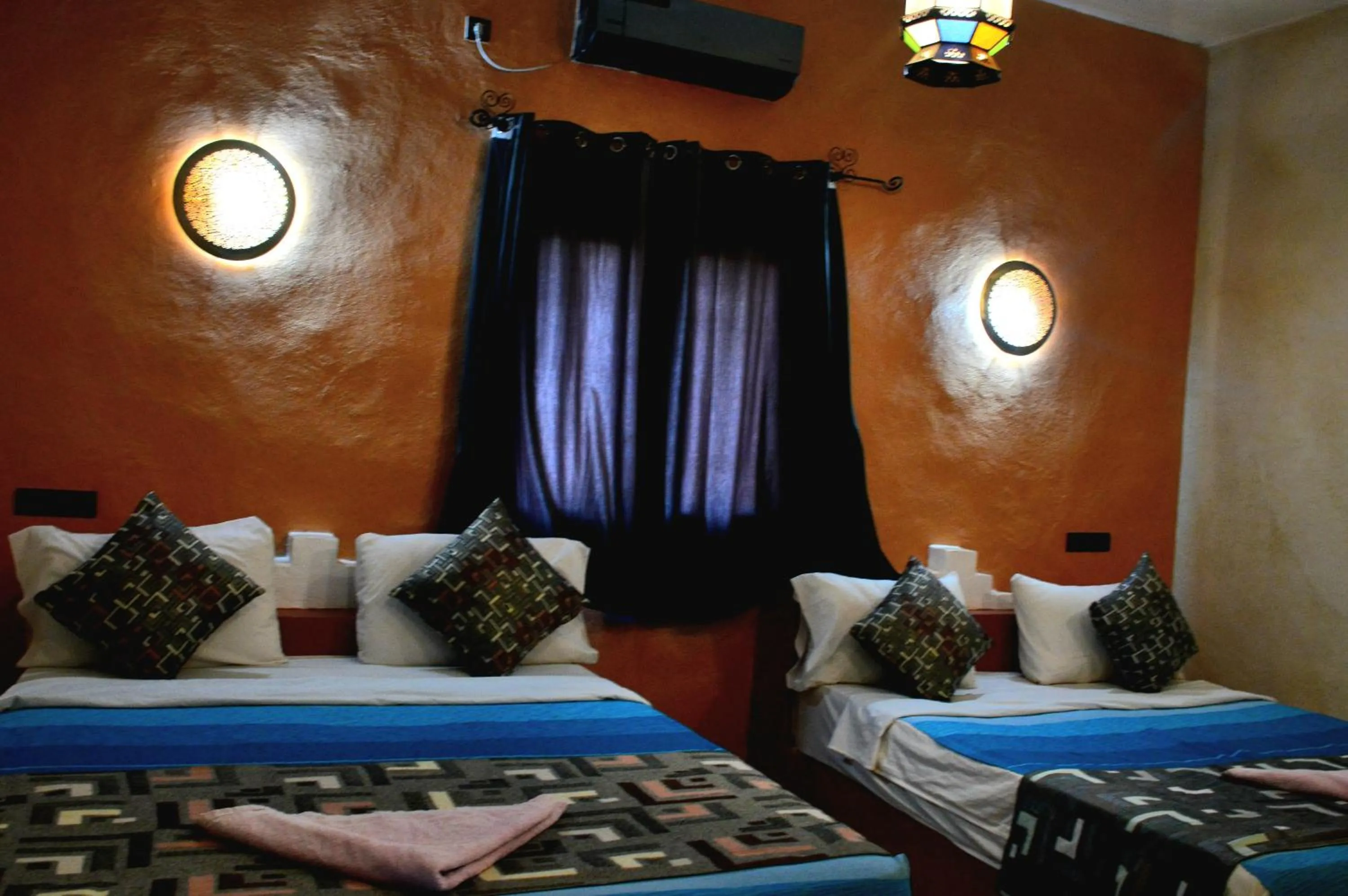 Bed in Kasbah Du Berger & Piscine