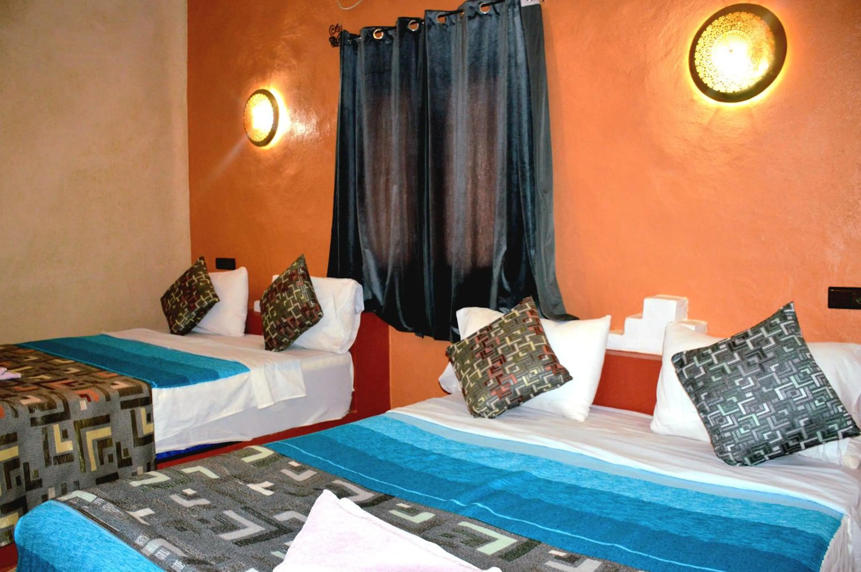 Bed in Kasbah Du Berger & Piscine