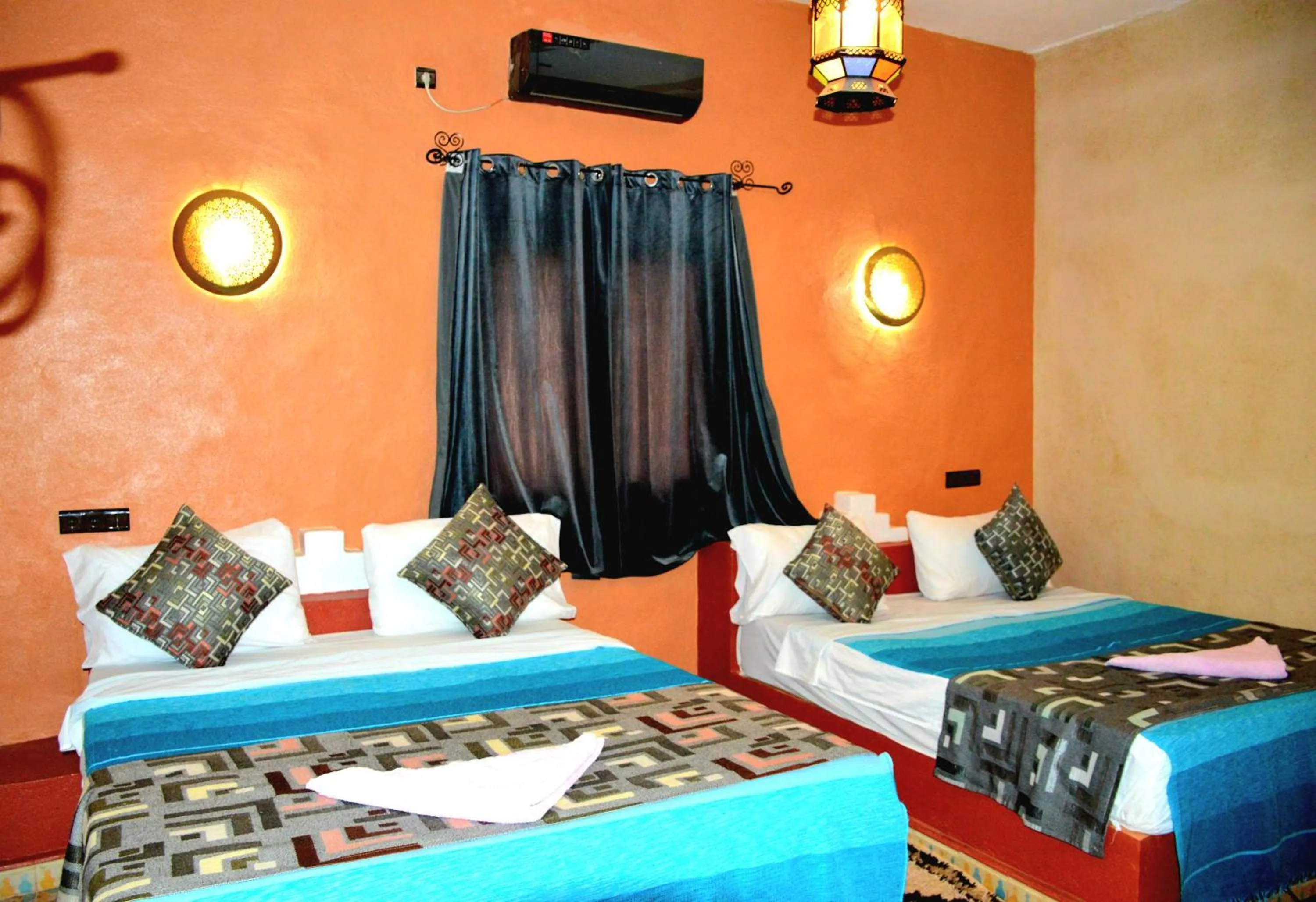 Bed in Kasbah Du Berger & Piscine