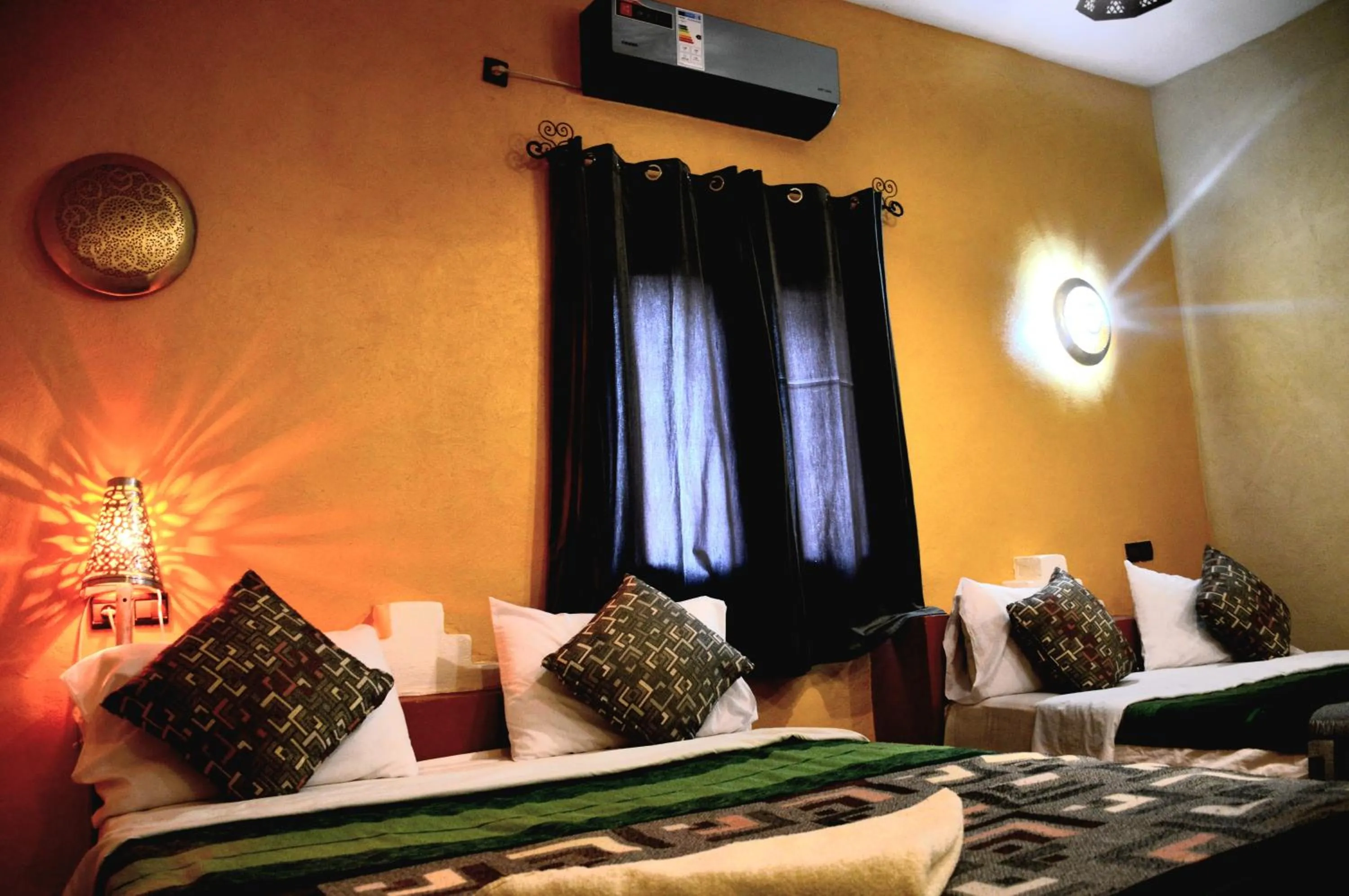 Bed in Kasbah Du Berger & Piscine