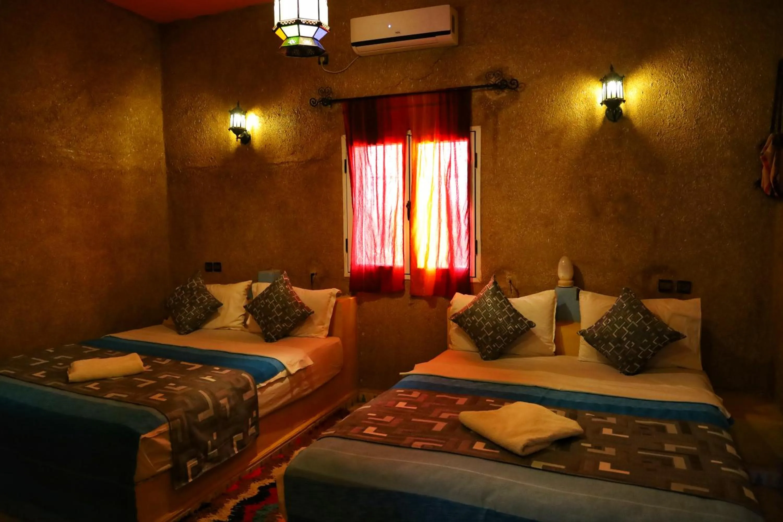 Bed in Kasbah Du Berger & Piscine