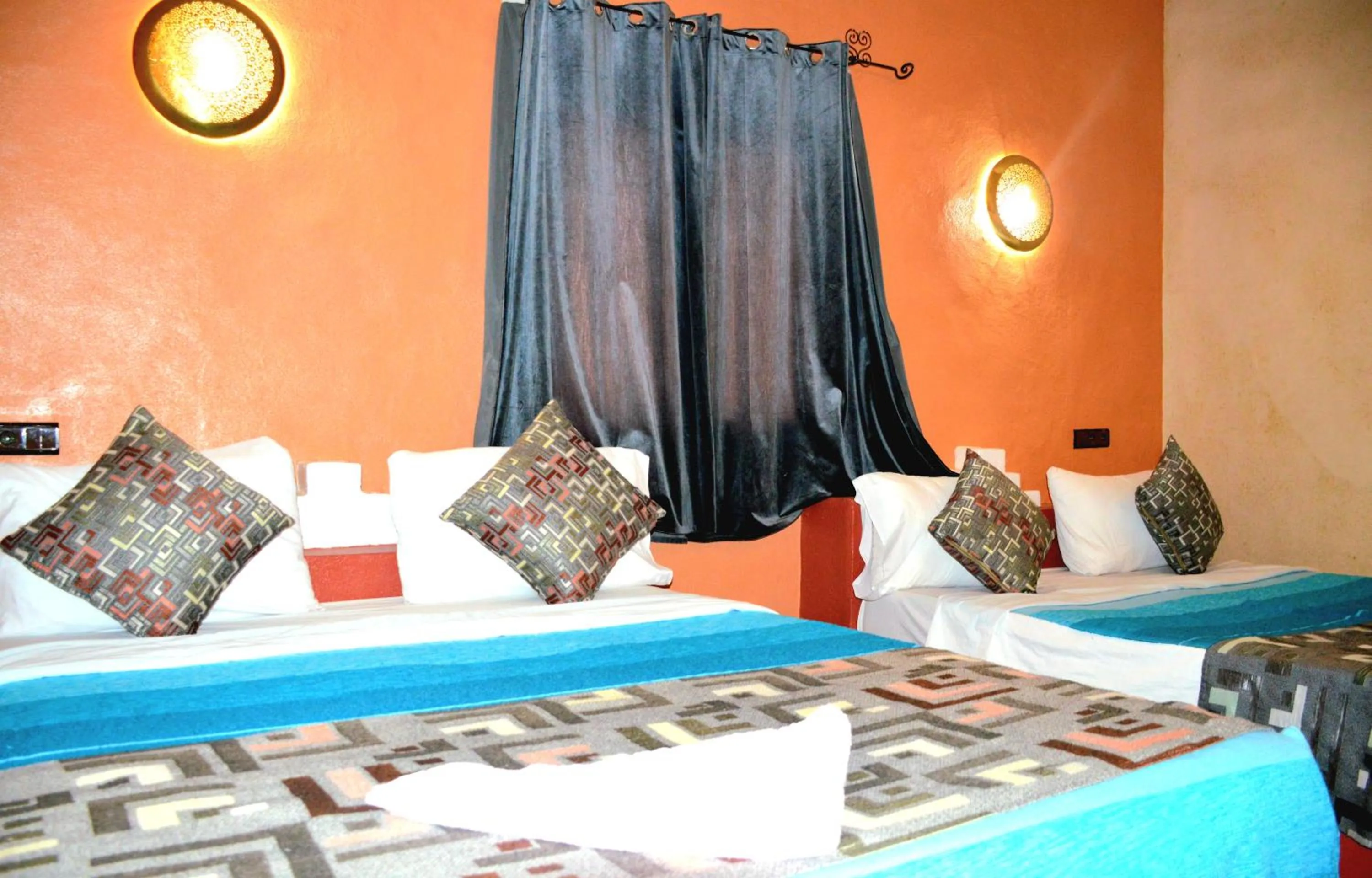 Bed in Kasbah Du Berger & Piscine