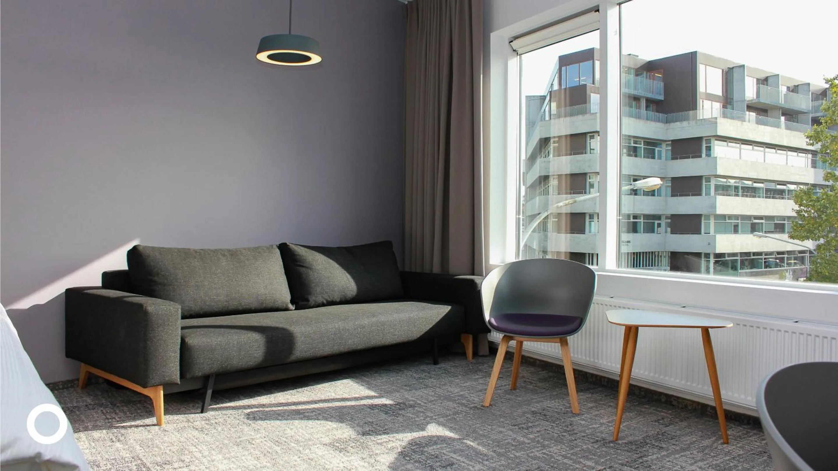 Living room in Midgardur by Center Hotels