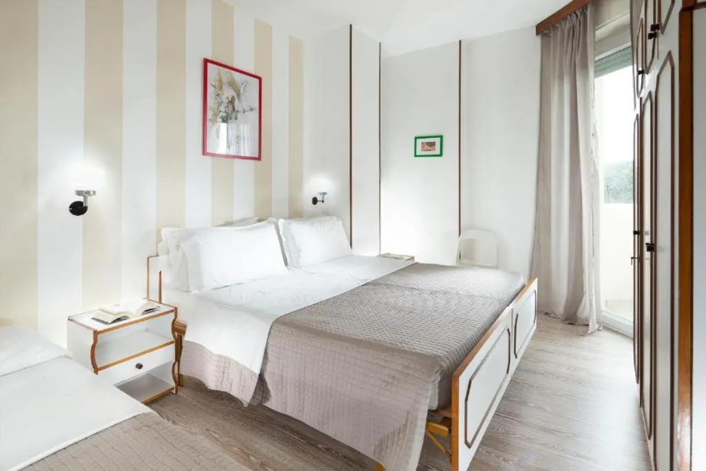 Bed in SoleMare Hotel e Residence