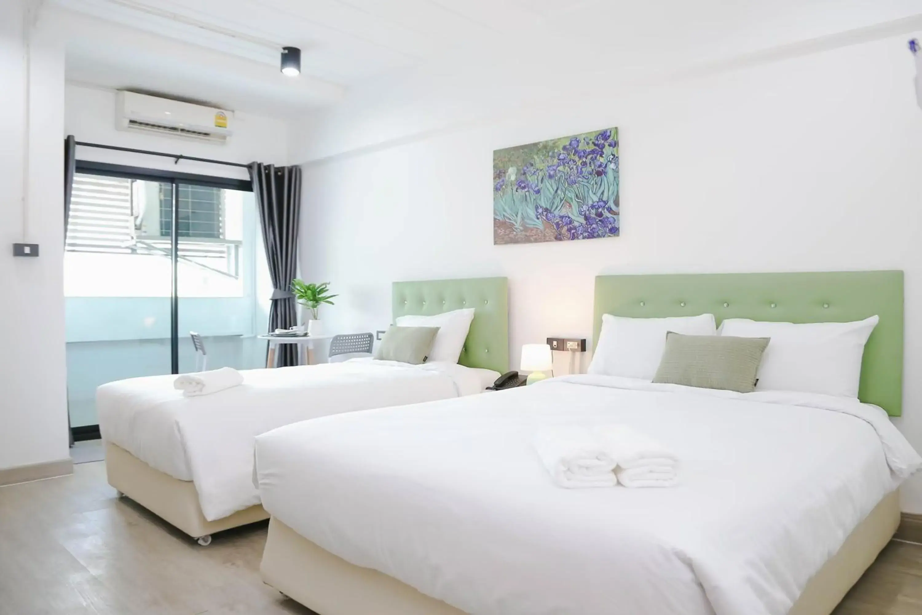 Deluxe Triple Room in Chana Bangkok Hotel Deluxe Triple Room in Chana Bangkok Hotel