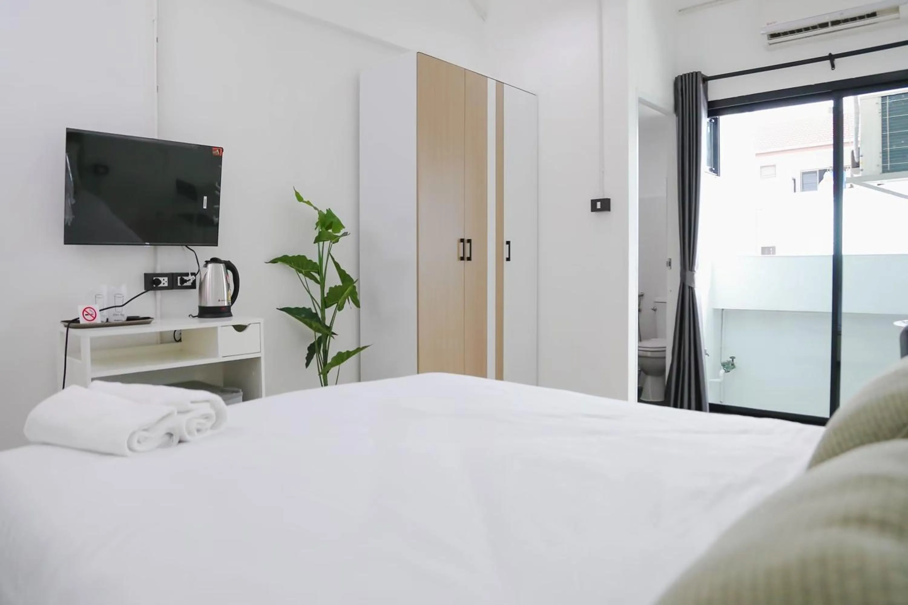 Bed in Chana Bangkok Hotel