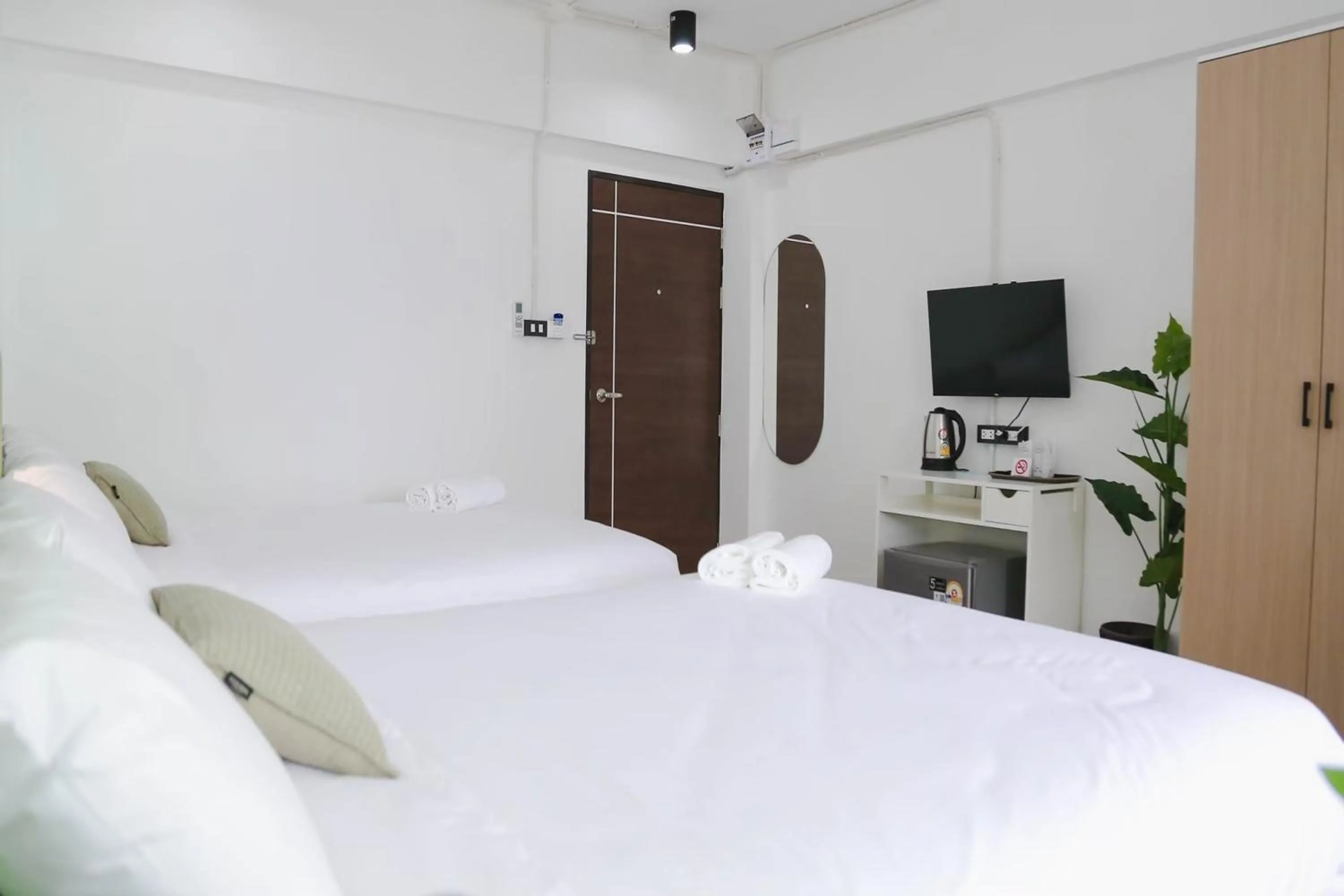 Bed in Chana Bangkok Hotel