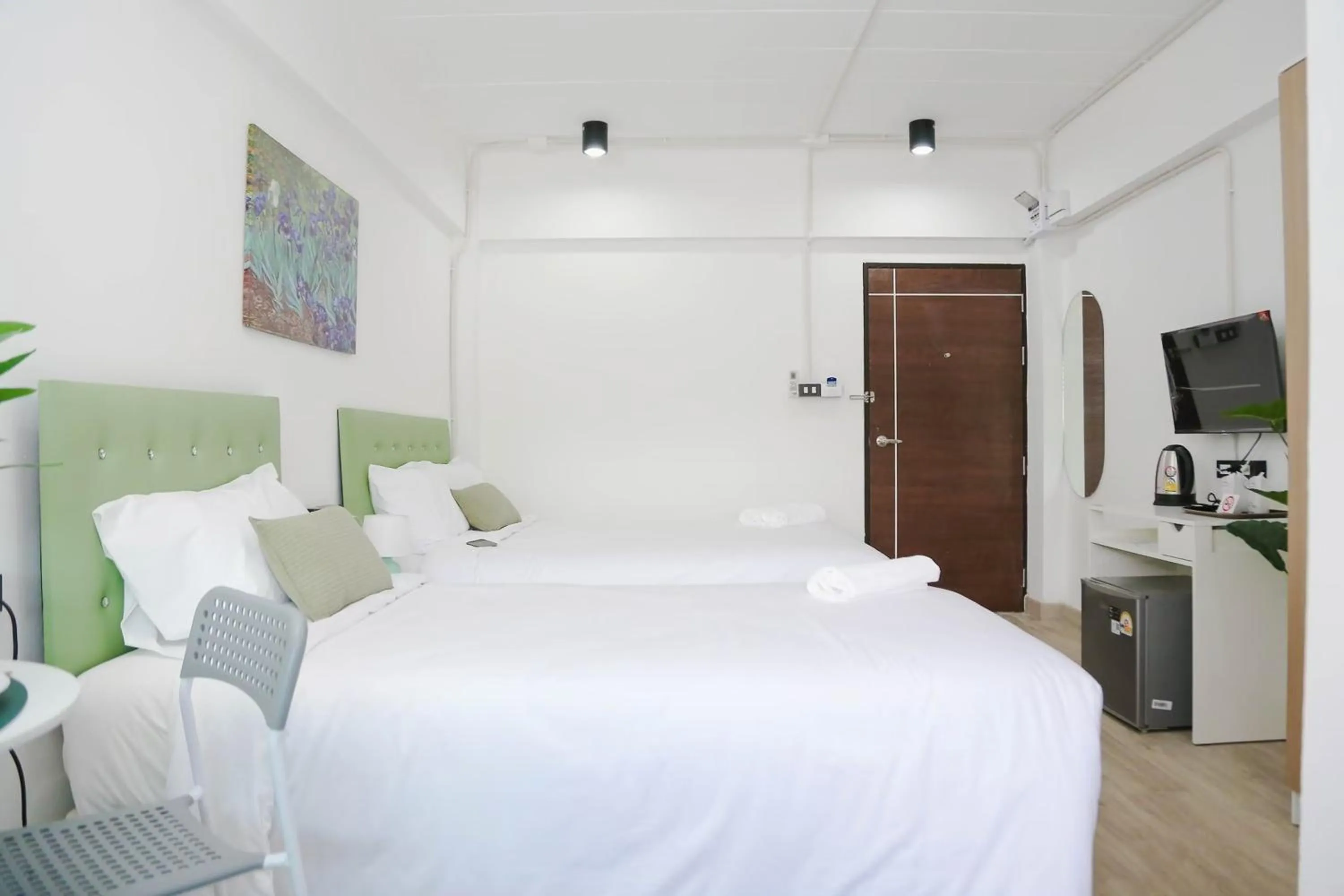 Bed in Chana Bangkok Hotel