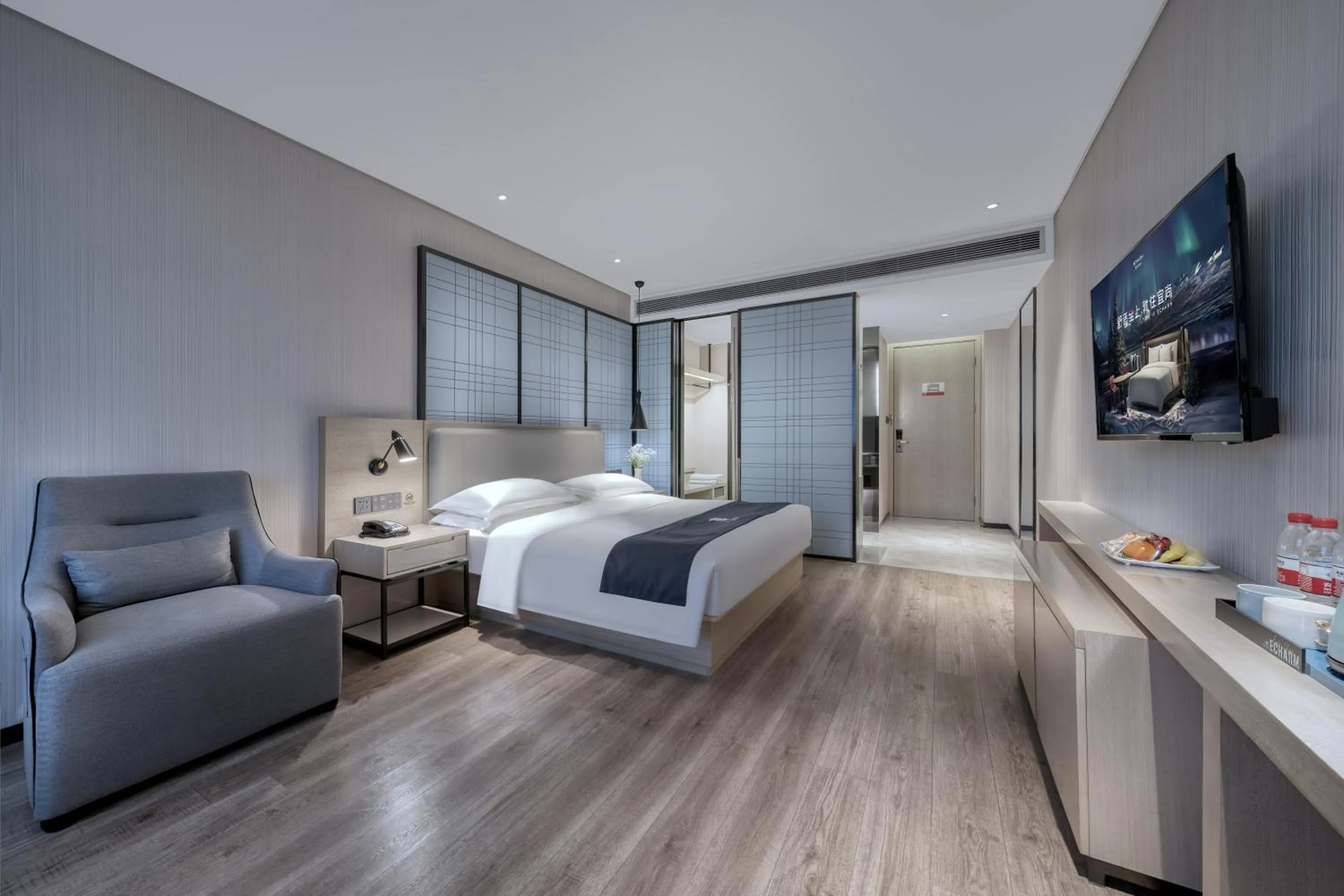 Bed in Echarm International Hotel Nanzhou Metro Station Branch