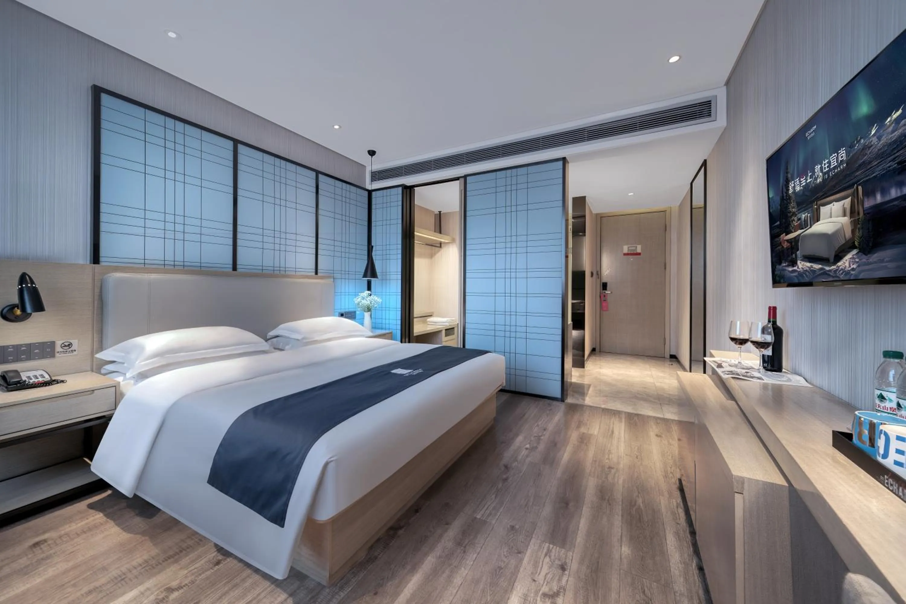 Bed in Echarm International Hotel Nanzhou Metro Station Branch