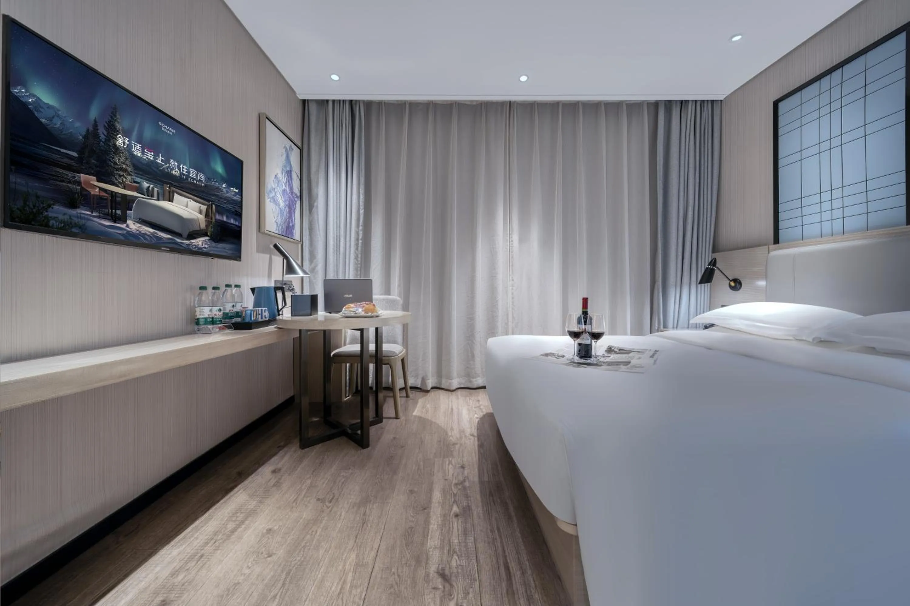 Bed in Echarm International Hotel Nanzhou Metro Station Branch