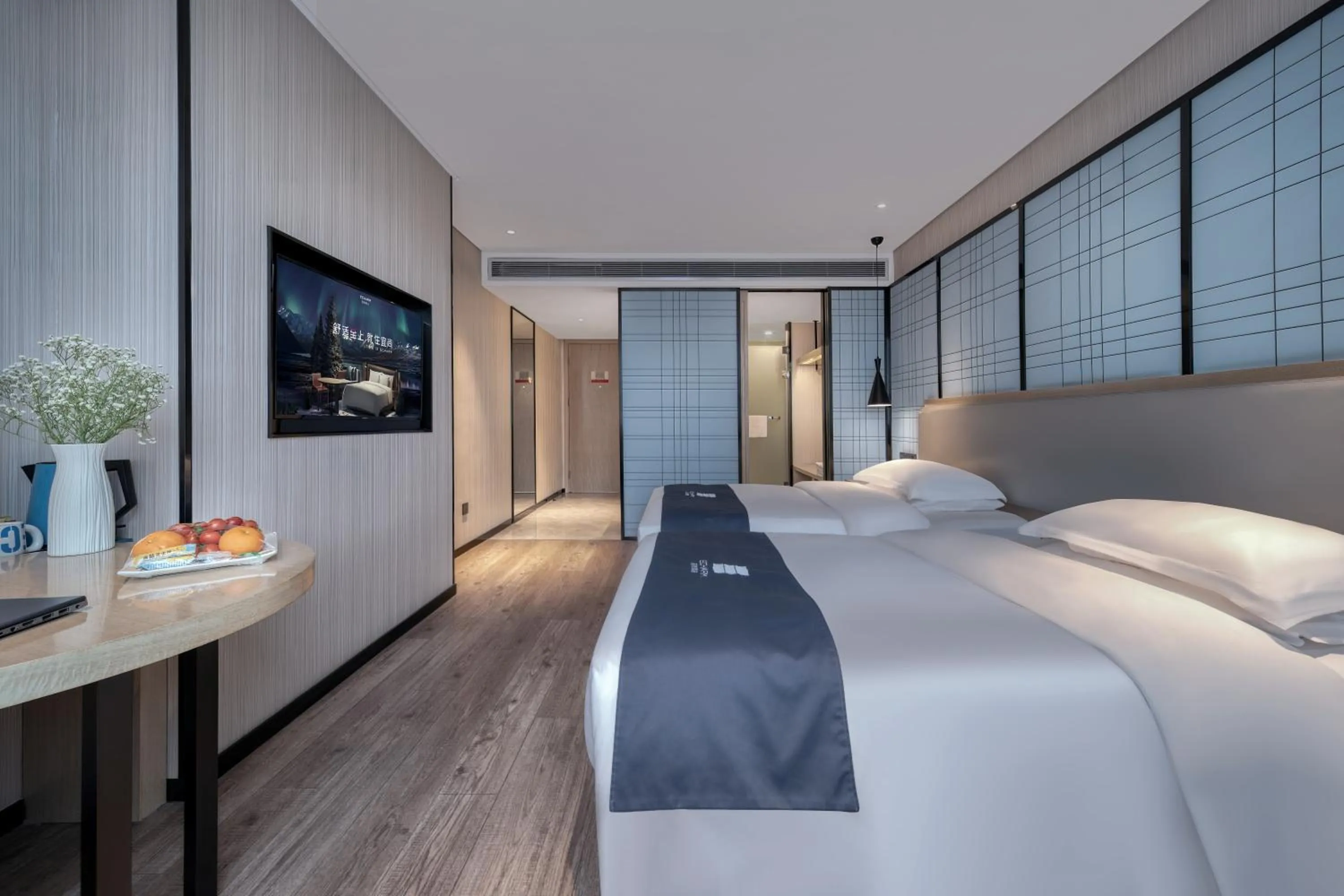 Bed in Echarm International Hotel Nanzhou Metro Station Branch