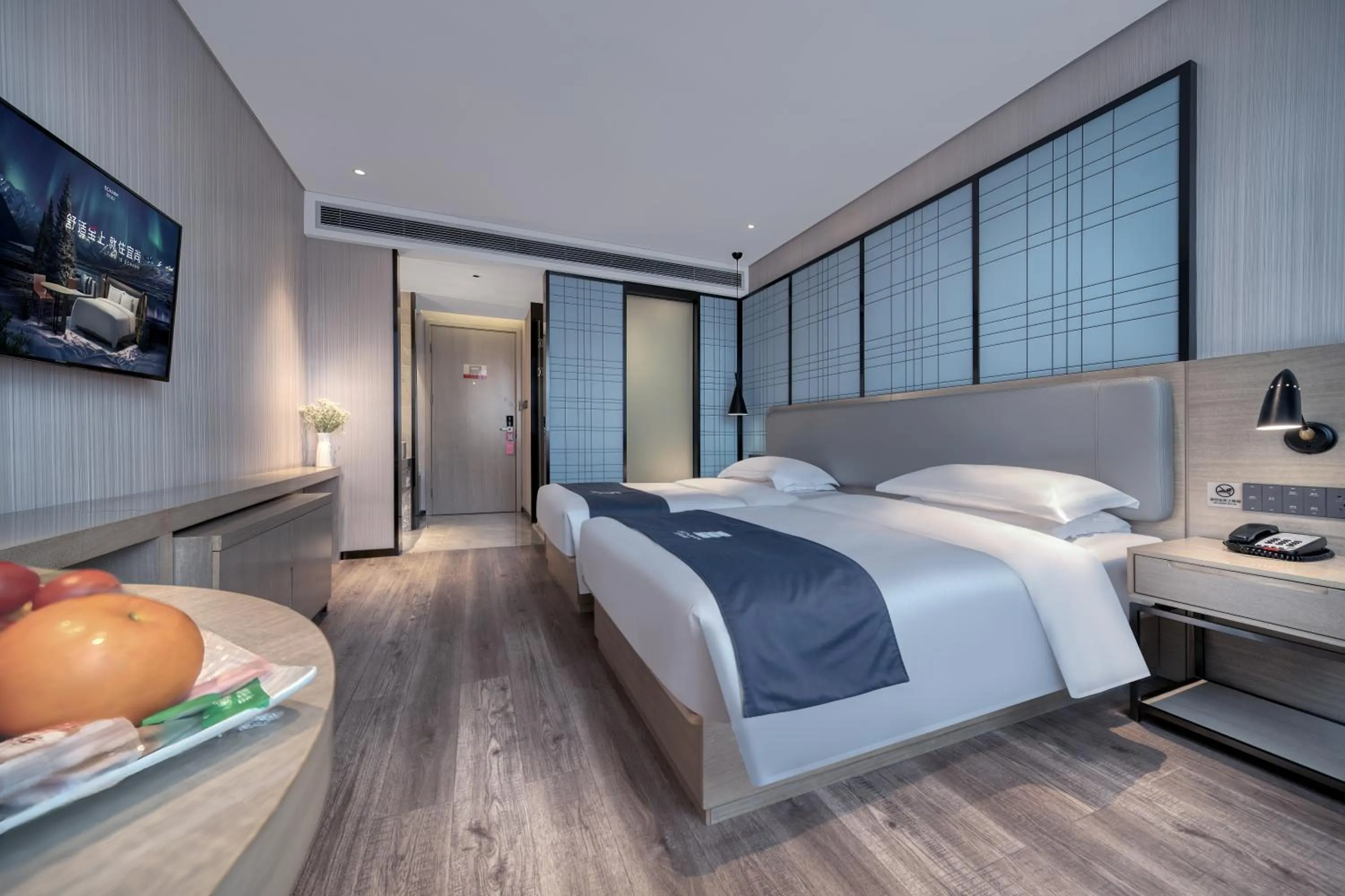 Bed in Echarm International Hotel Nanzhou Metro Station Branch