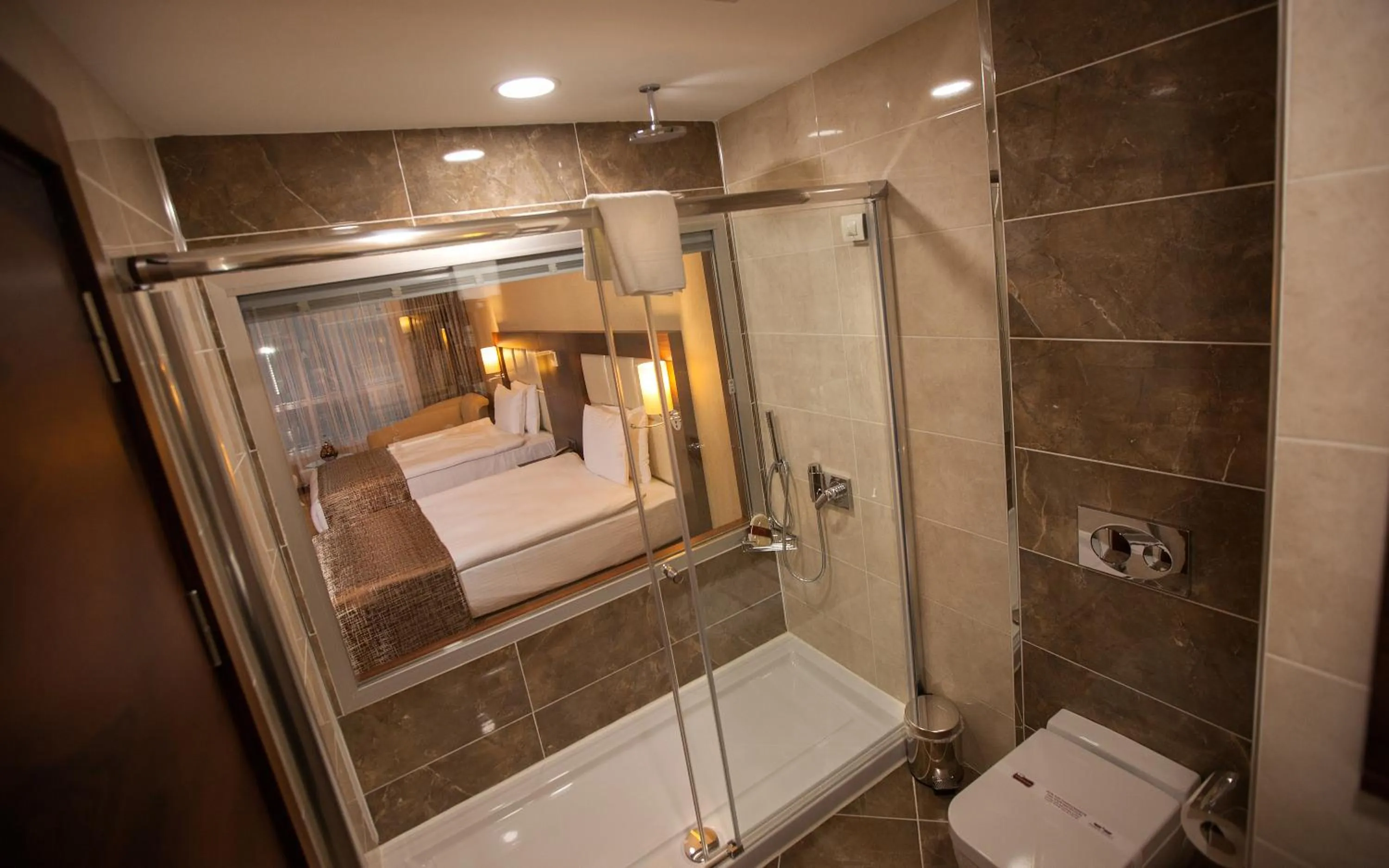 Bathroom in Mitannia Regency Hotel