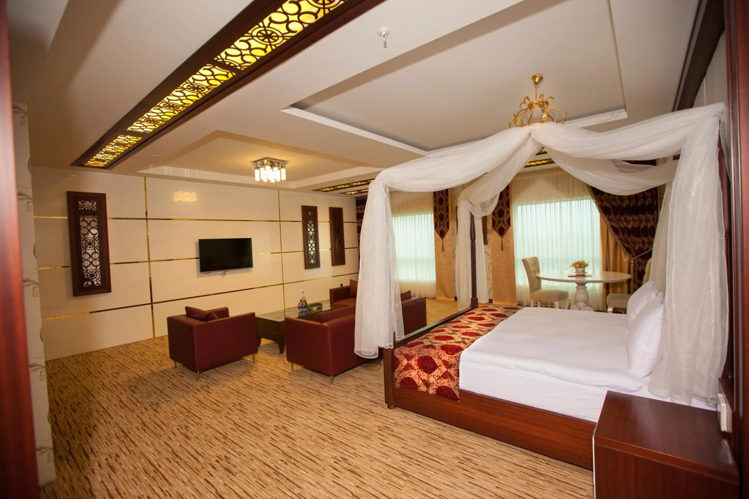 Bedroom in Mitannia Regency Hotel