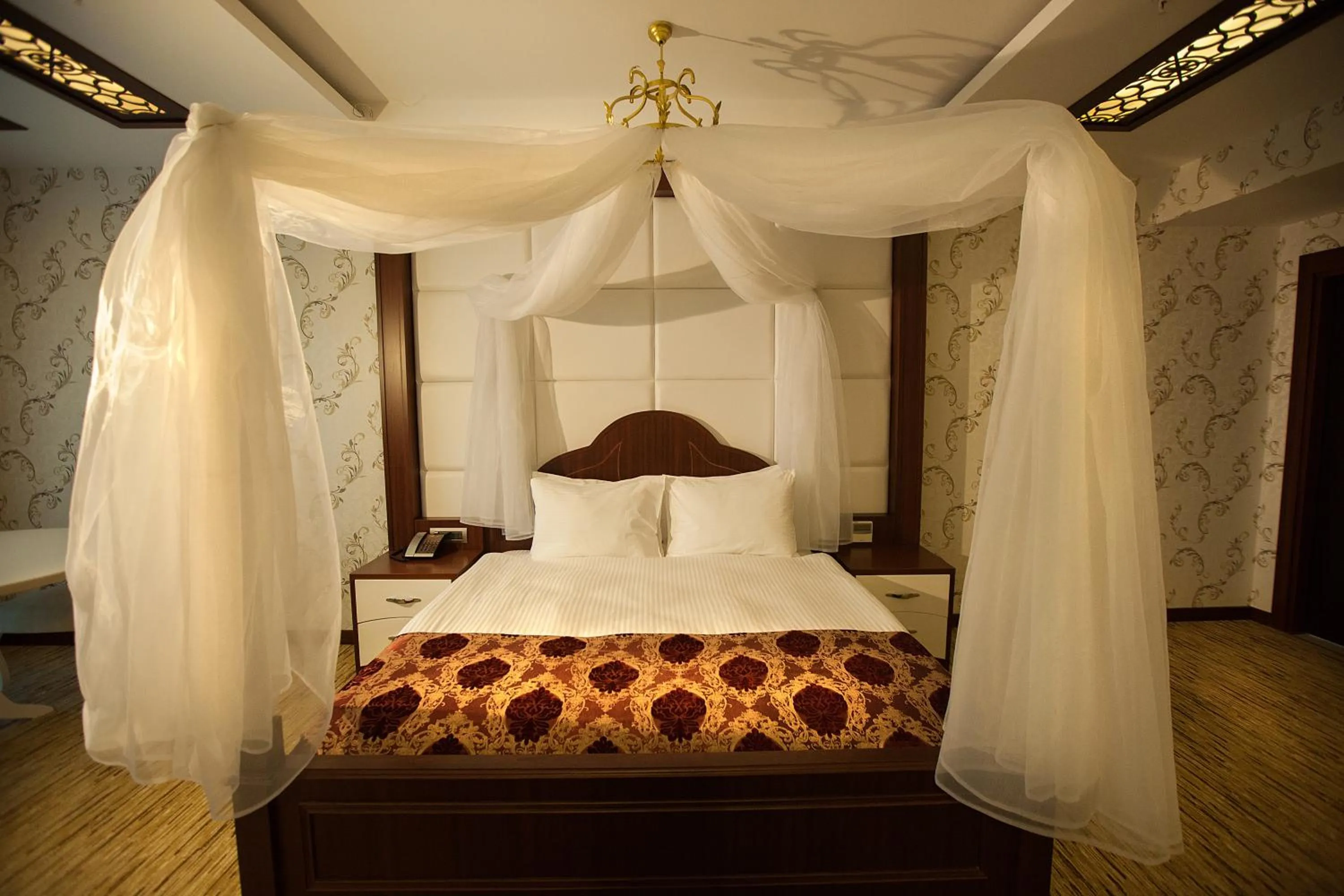 Bedroom in Mitannia Regency Hotel