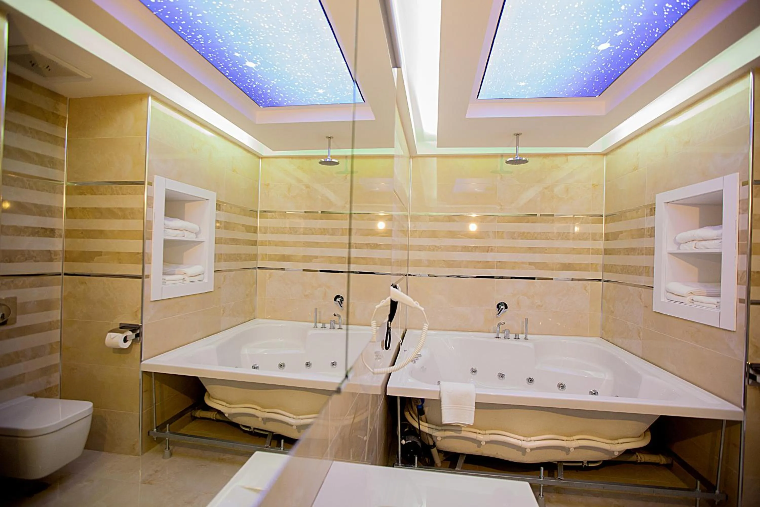 Bathroom in Mitannia Regency Hotel