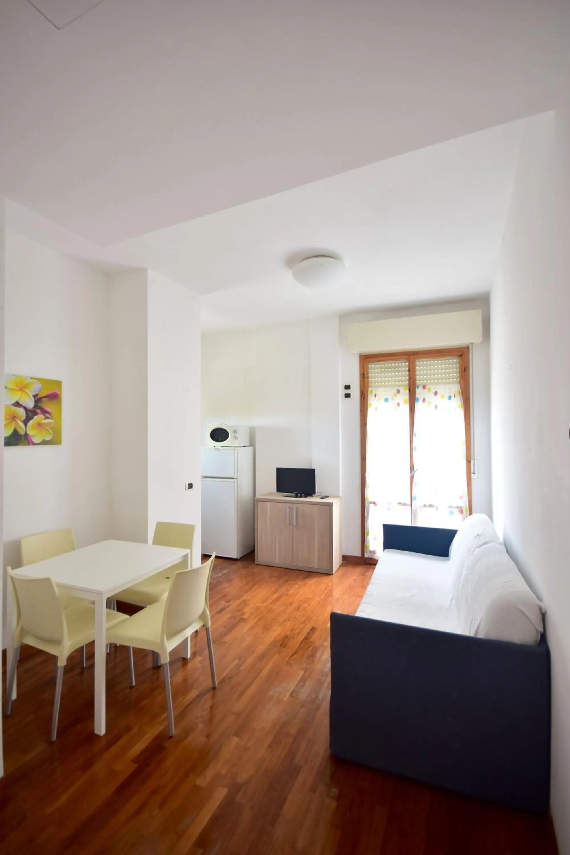 Seating area, Bed in Residence Avana