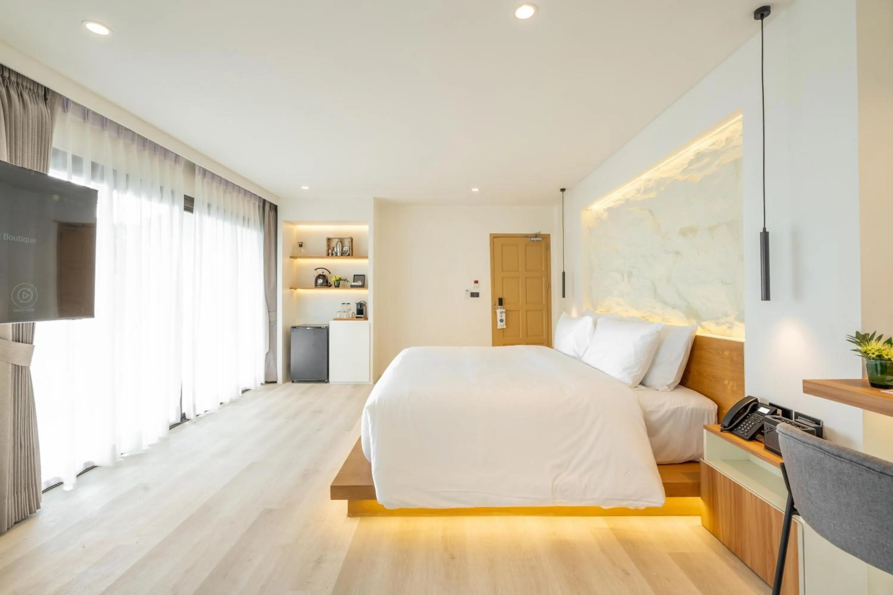 Bed in ANONA SUNSET Boutique