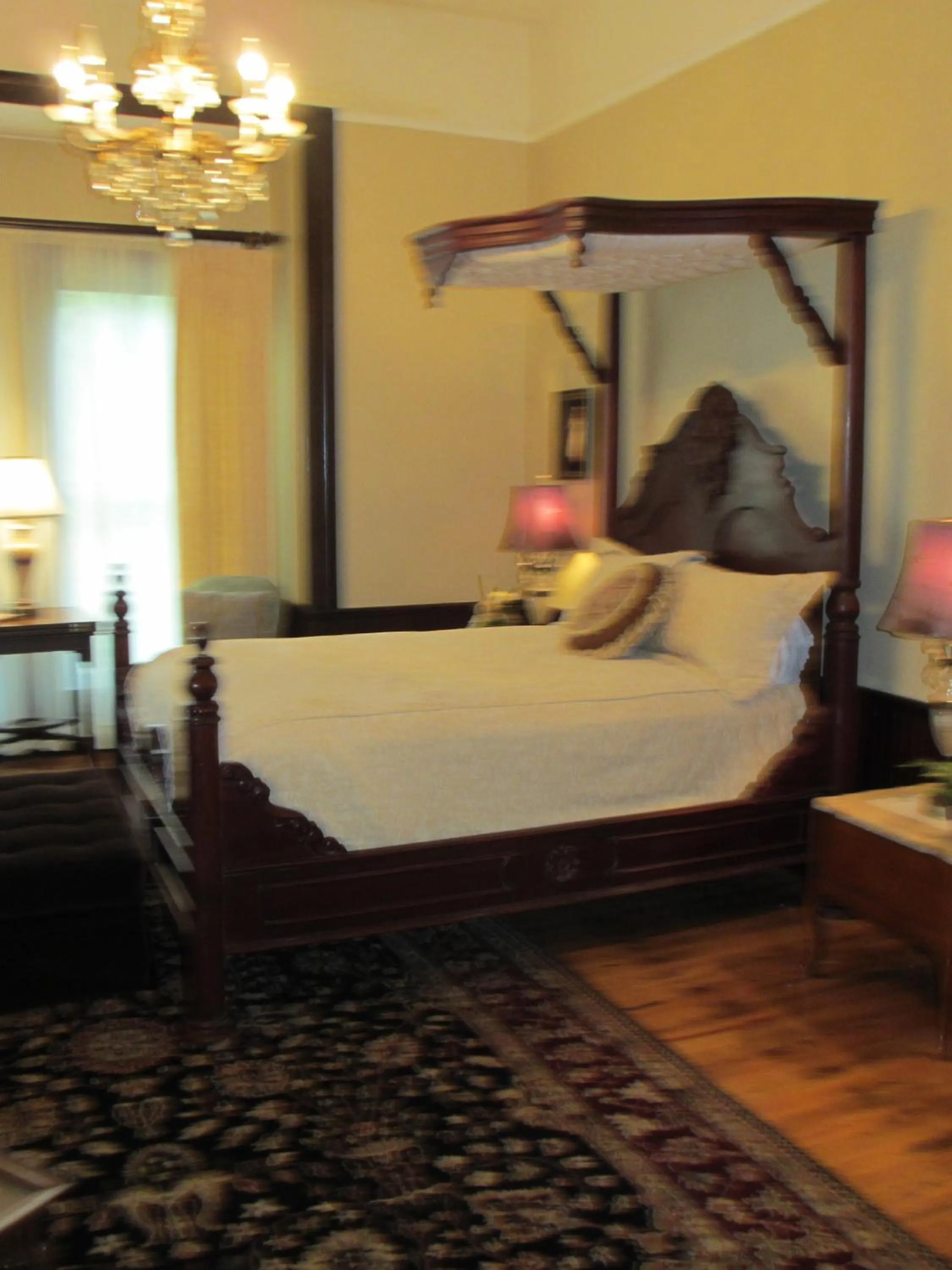 Bed in Adair Manor Bed & Breakfast