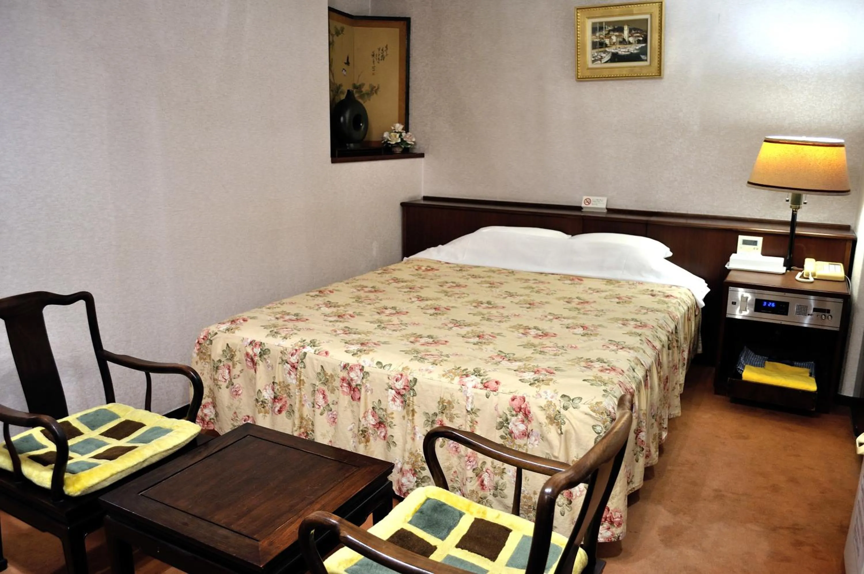 Bed in Hotel Los Inn Kochi