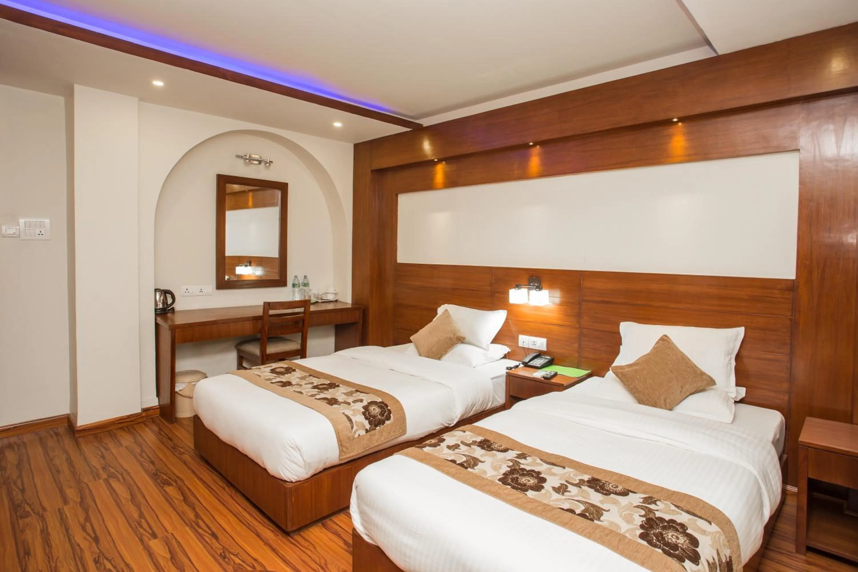 Bed in Aryatara Kathmandu Hotel