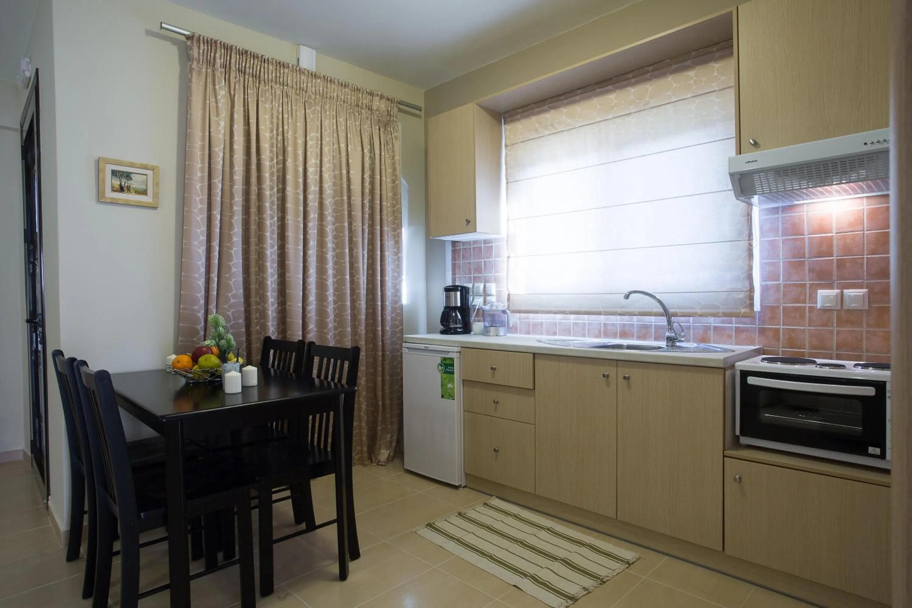 Kitchen or kitchenette in Baywatch Hotel