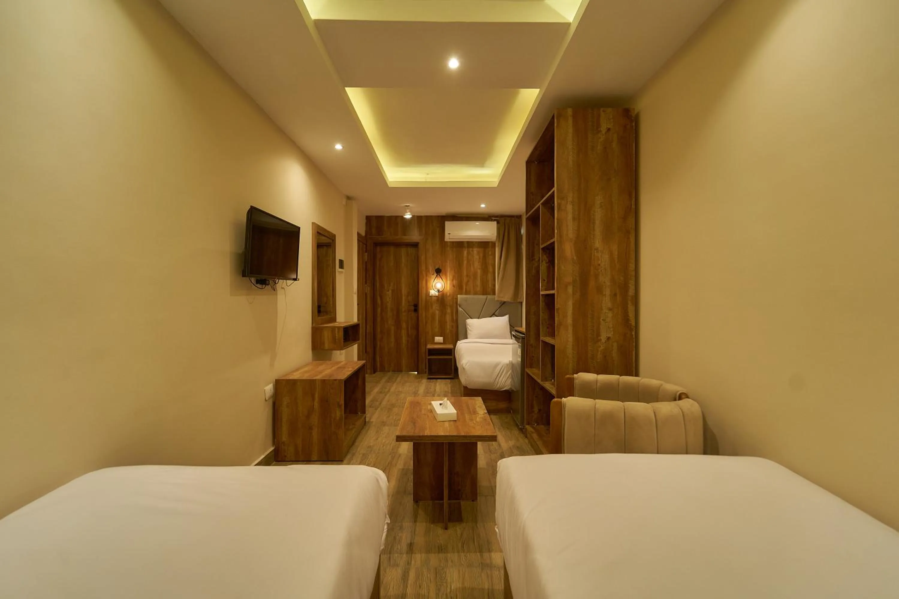 Bed in Crown Pyramids View Hotel