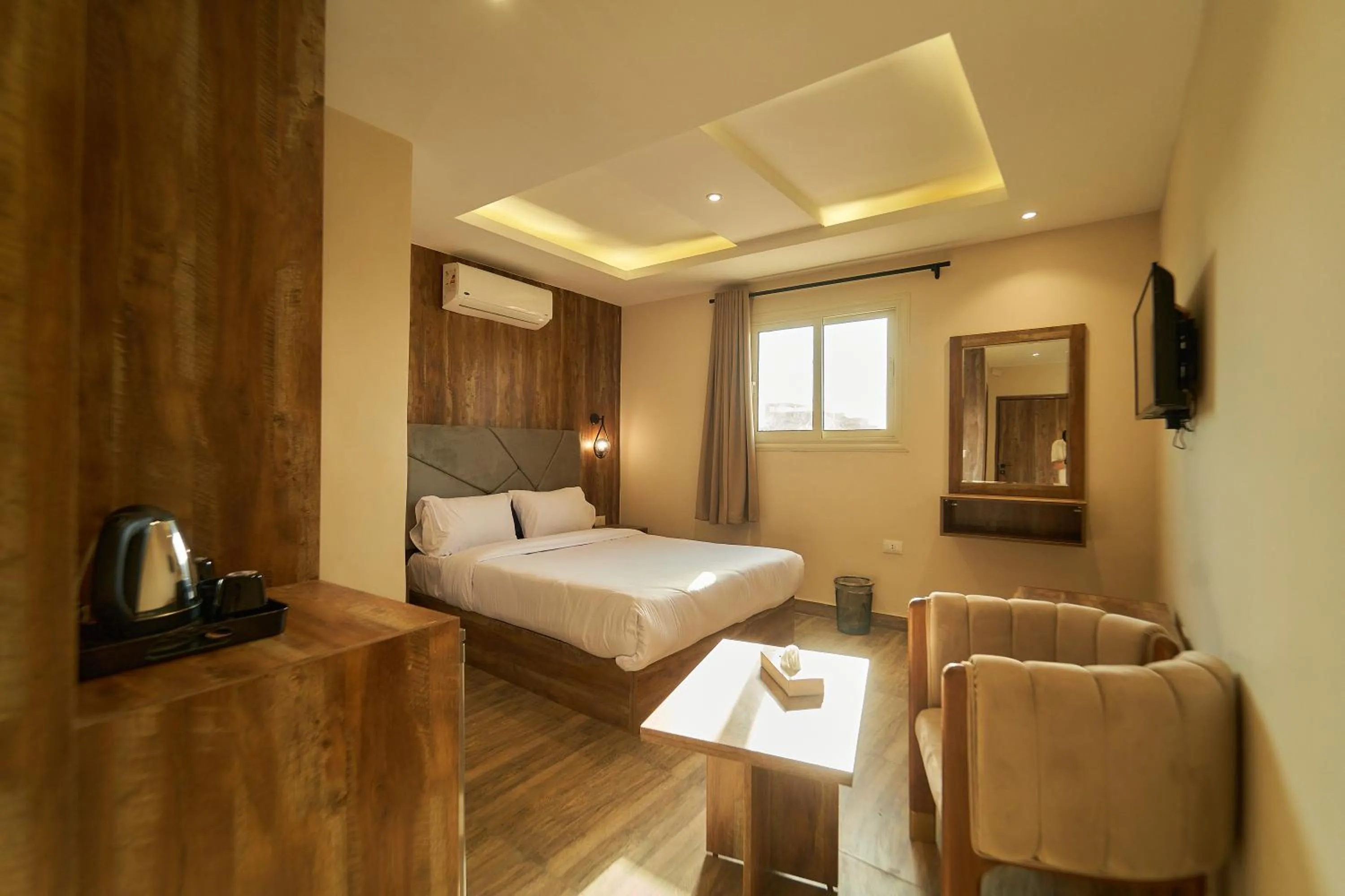 Bed in Crown Pyramids View Hotel