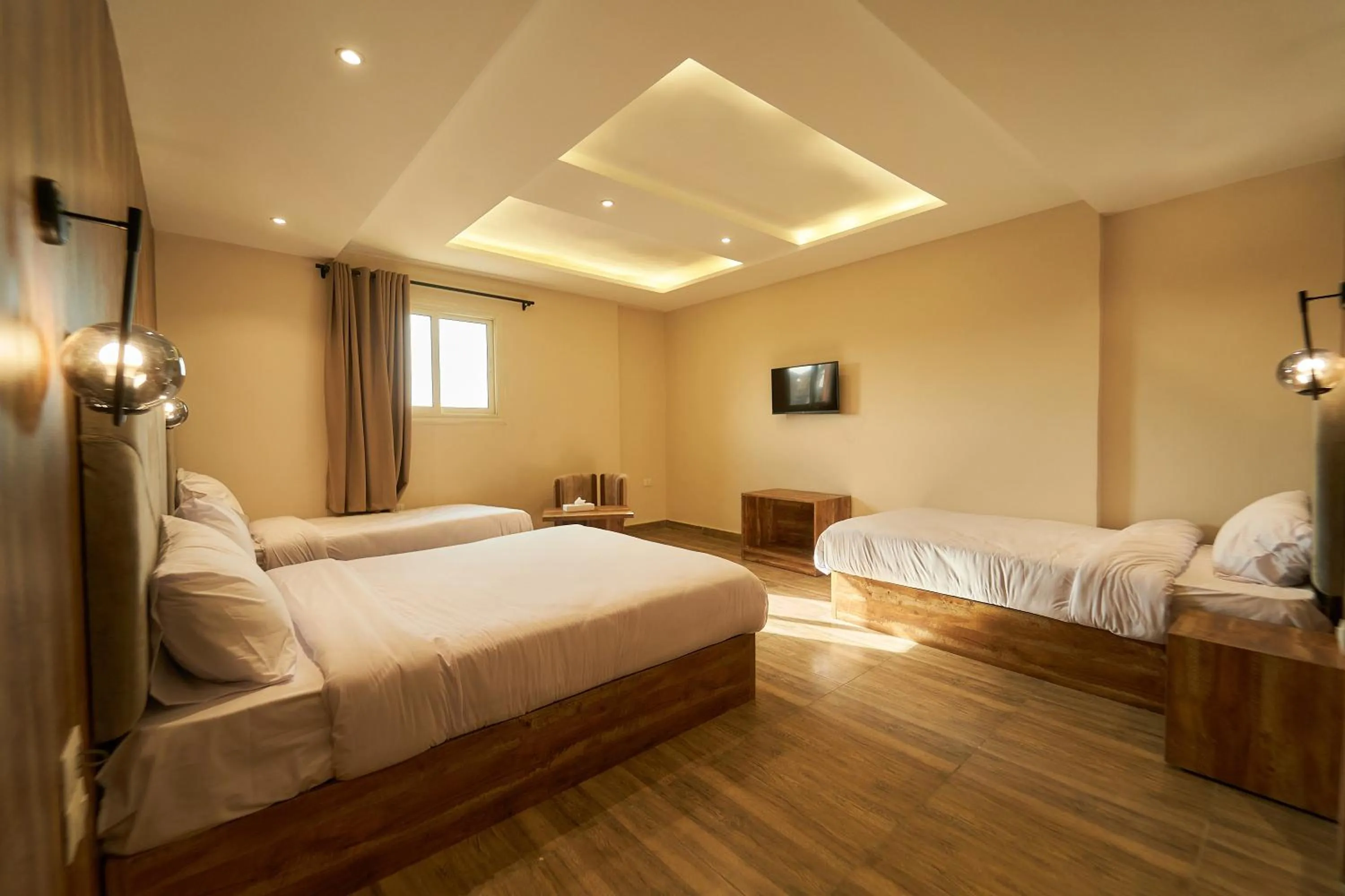 Bed in Crown Pyramids View Hotel