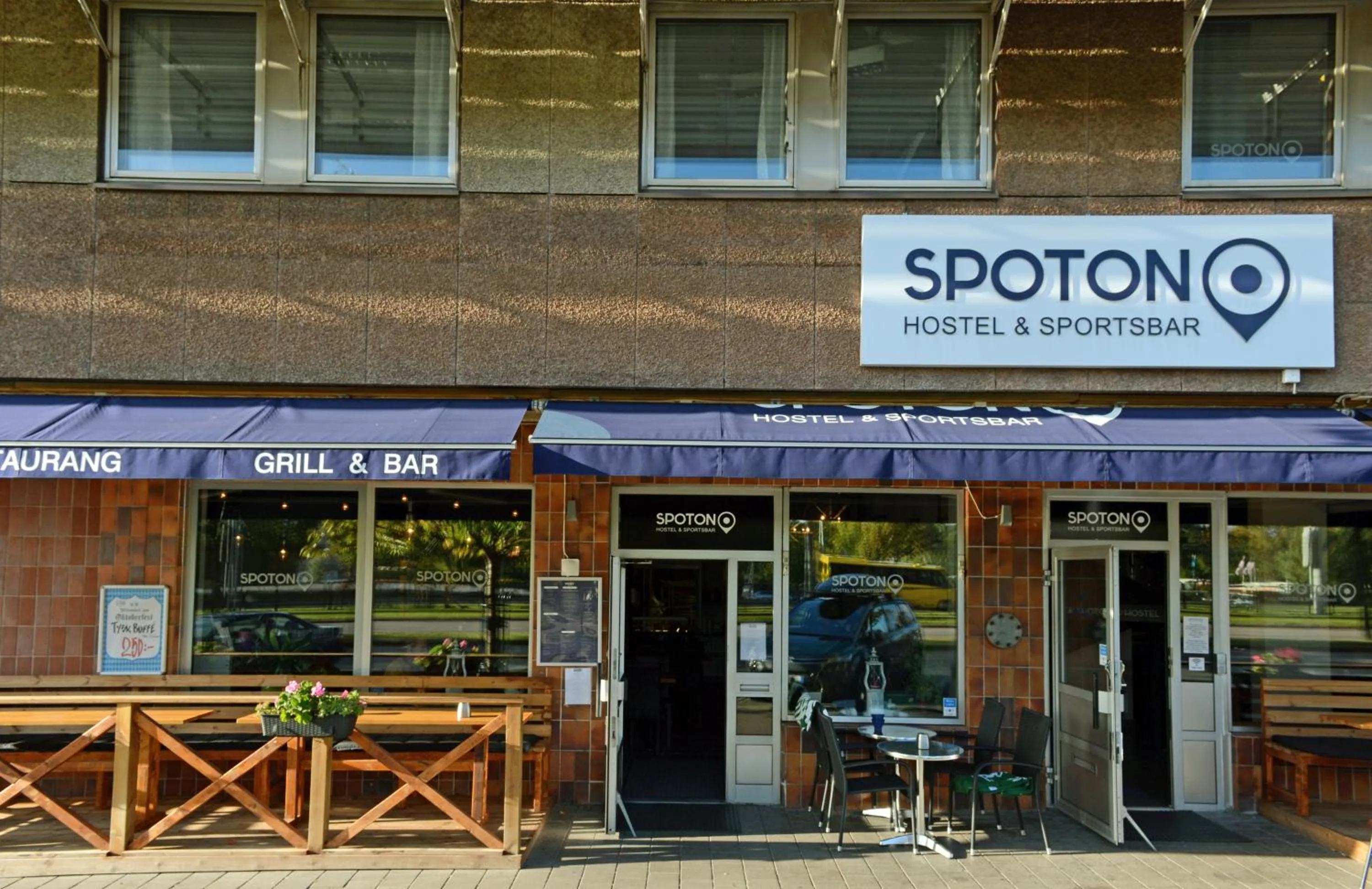 Property logo or sign in Spoton Hostel & Sportsbar