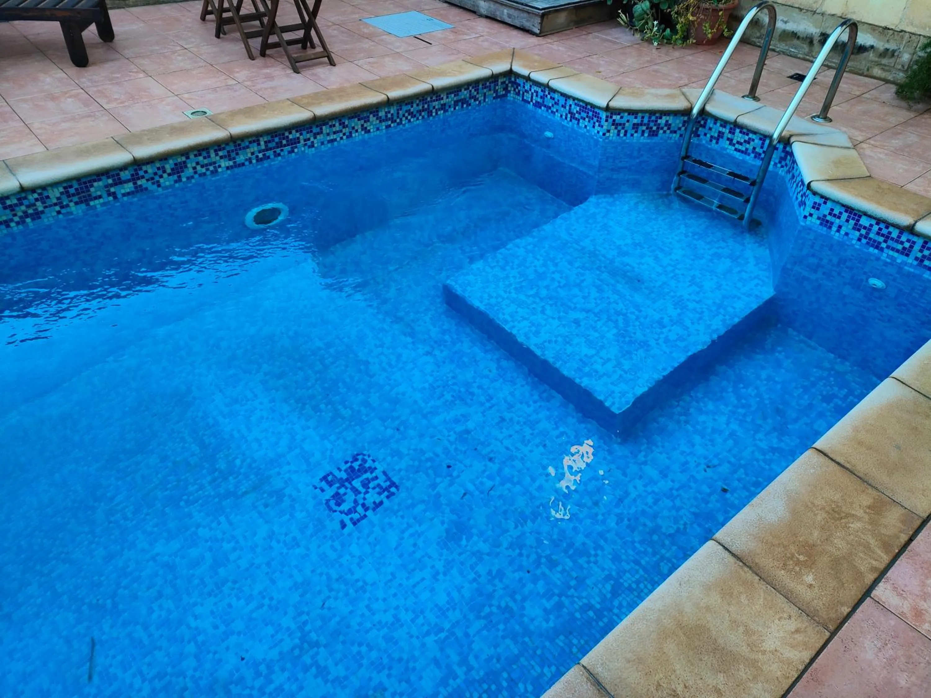 Pool view in Grotto's Paradise B&B