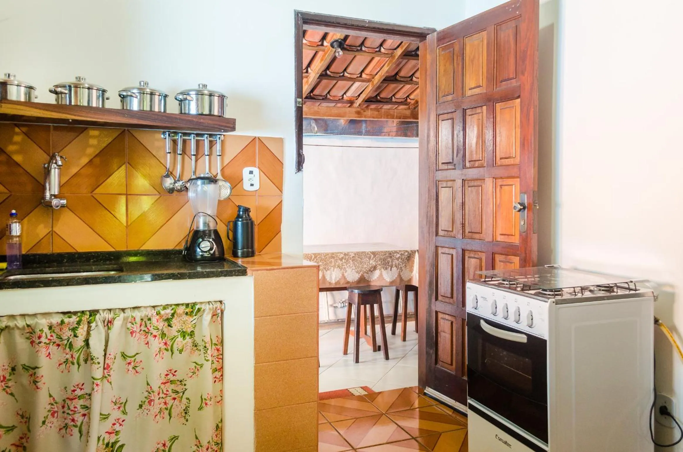 Kitchen or kitchenette in Pousada do Mineiro