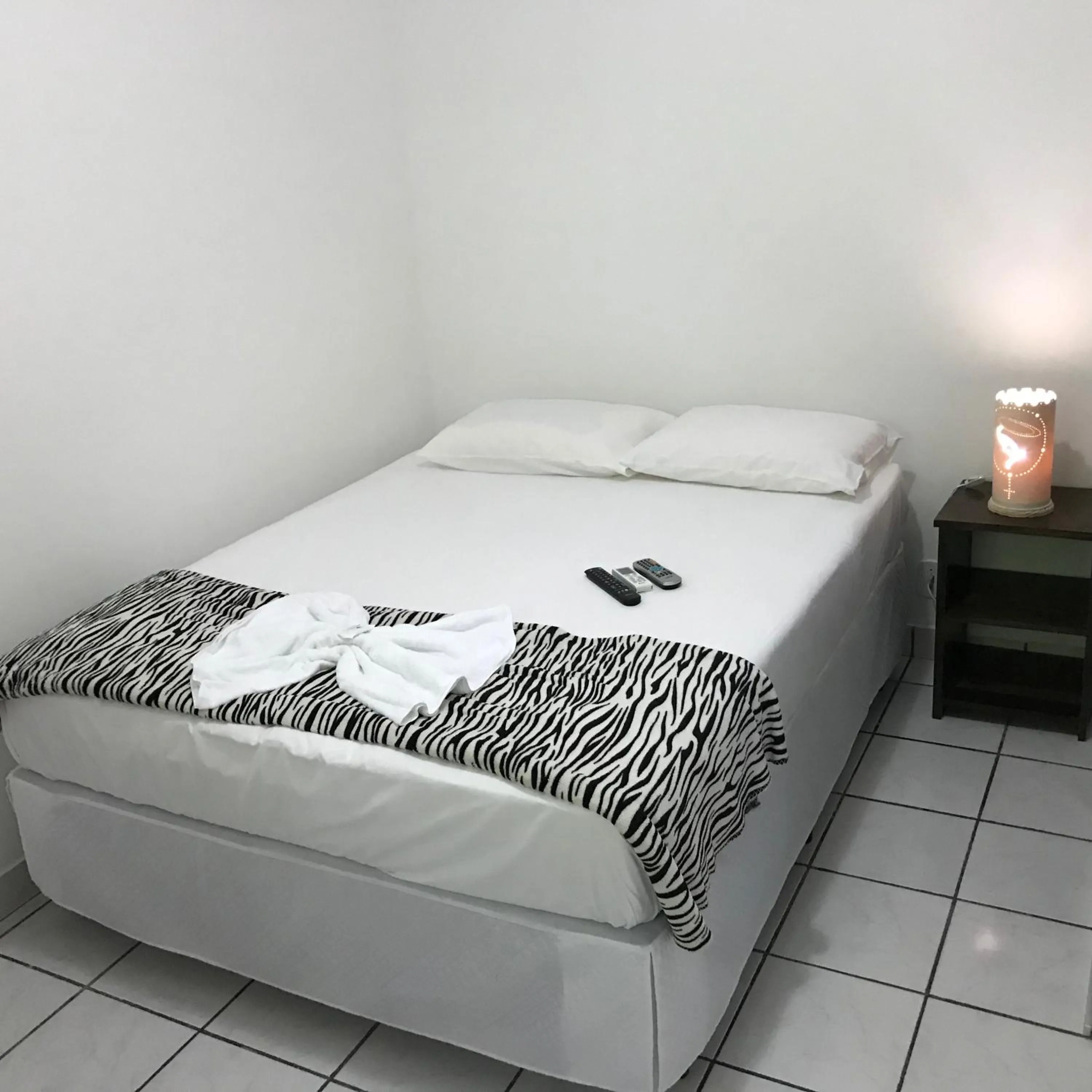 Bed in Pousada do Mineiro