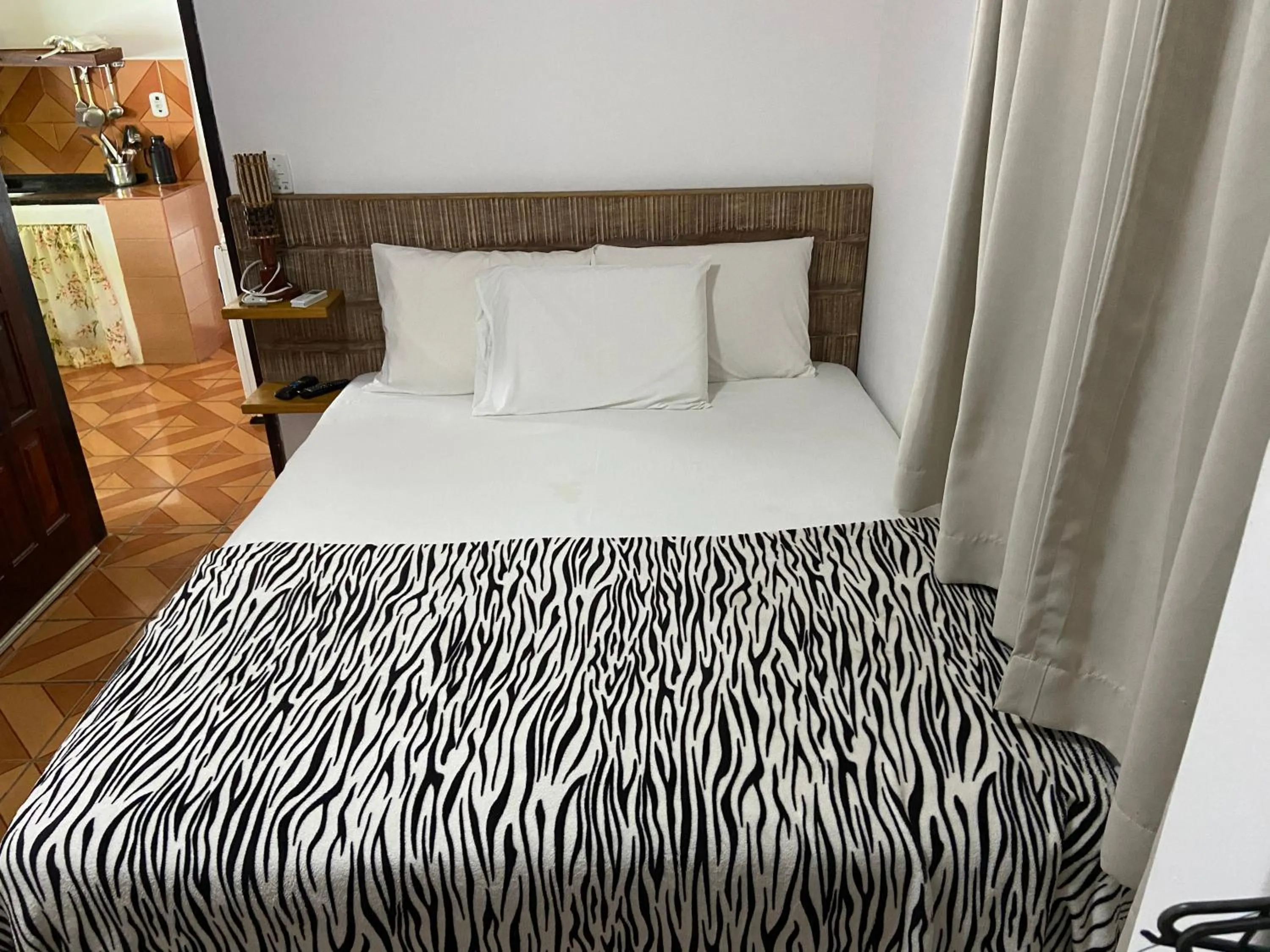 Bed in Pousada do Mineiro